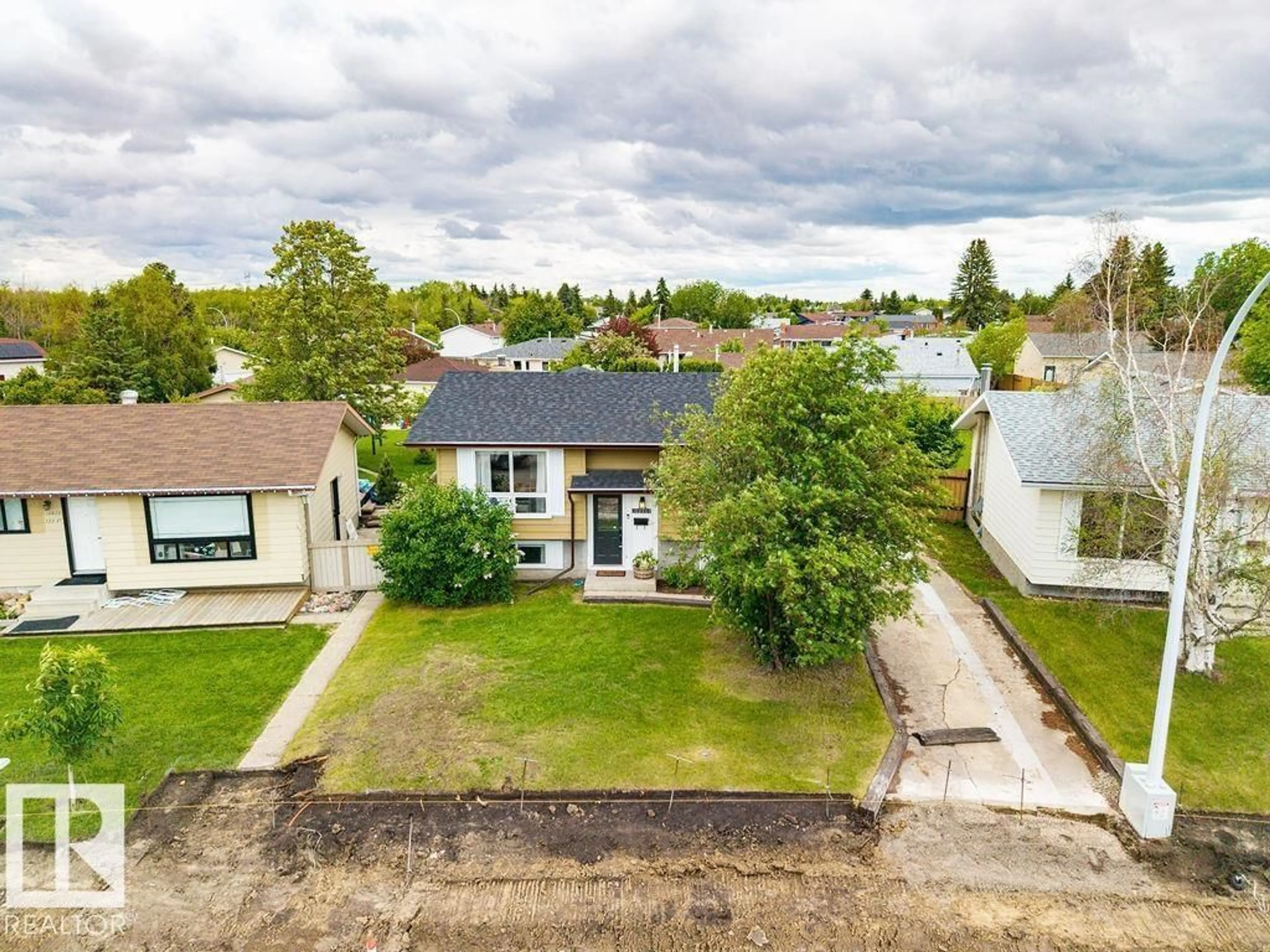 A pic from outside/outdoor area/front of a property/back of a property/a pic from drone, street for NW - 16035 123 ST, Edmonton Alberta T5X2W2