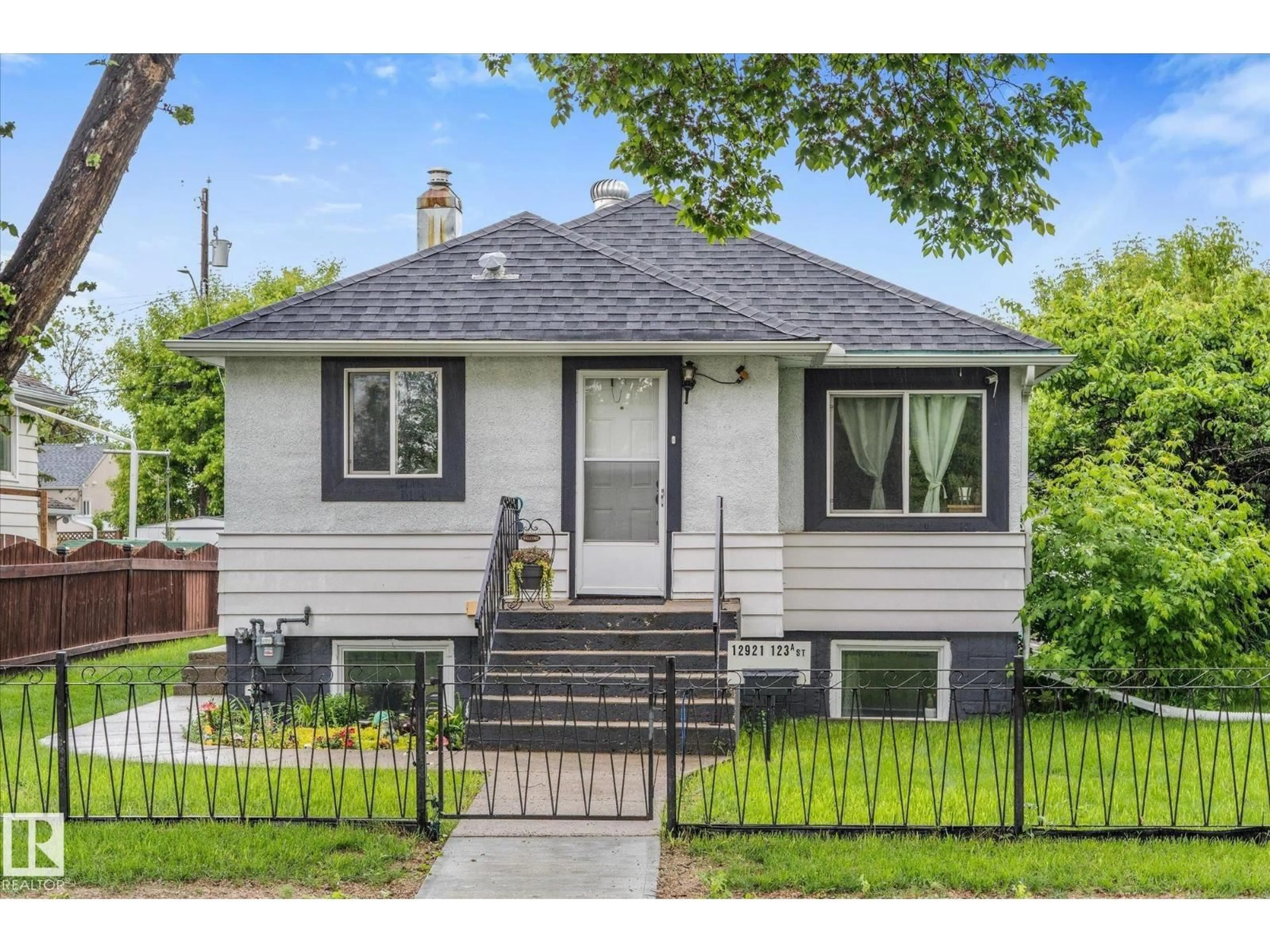 Home with vinyl exterior material, street for NW - 12921 123A ST, Edmonton Alberta T5L0L1