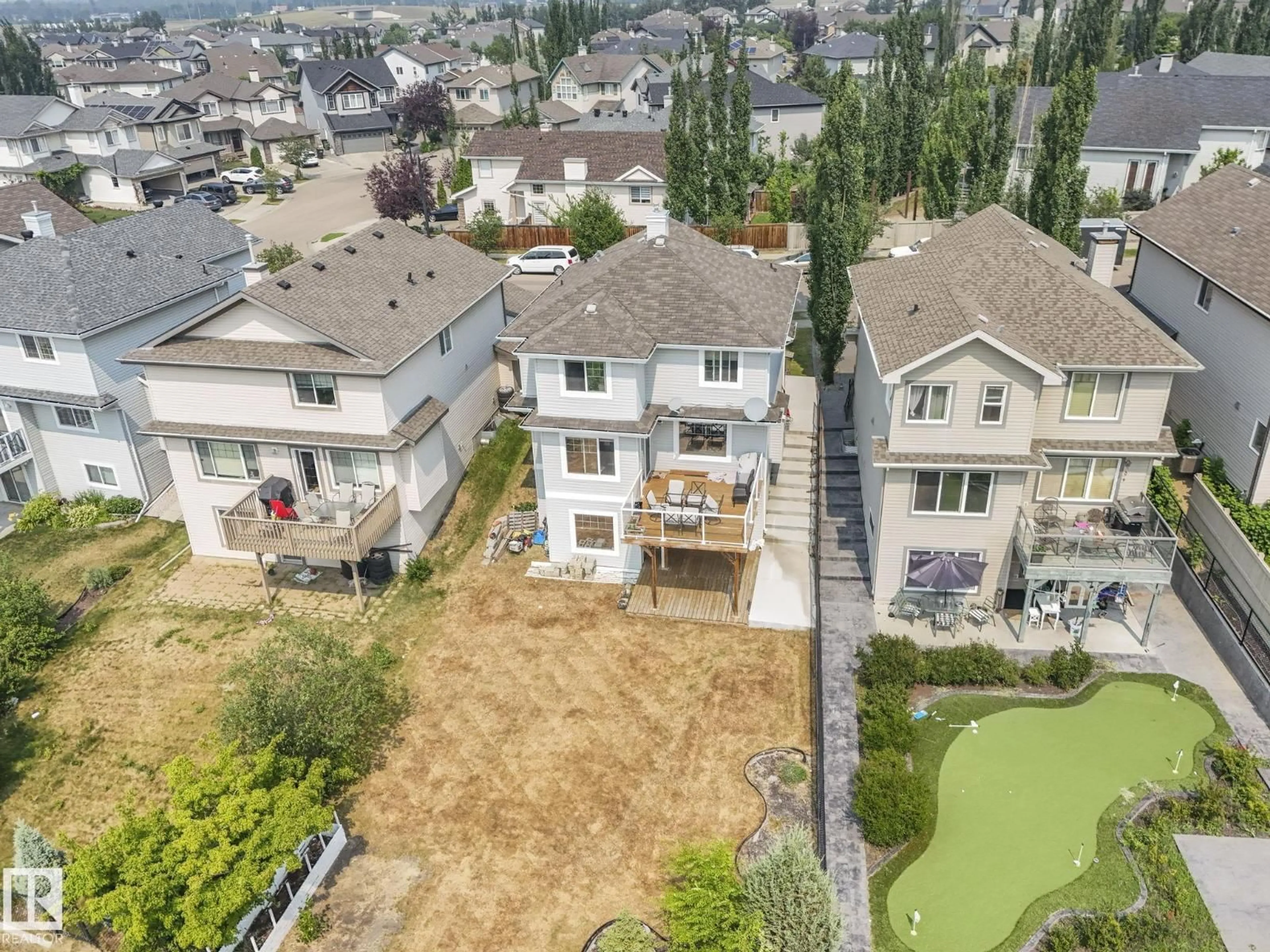 A pic from outside/outdoor area/front of a property/back of a property/a pic from drone, mountain view for SW - 6303 4 AV, Edmonton Alberta T6X0C2