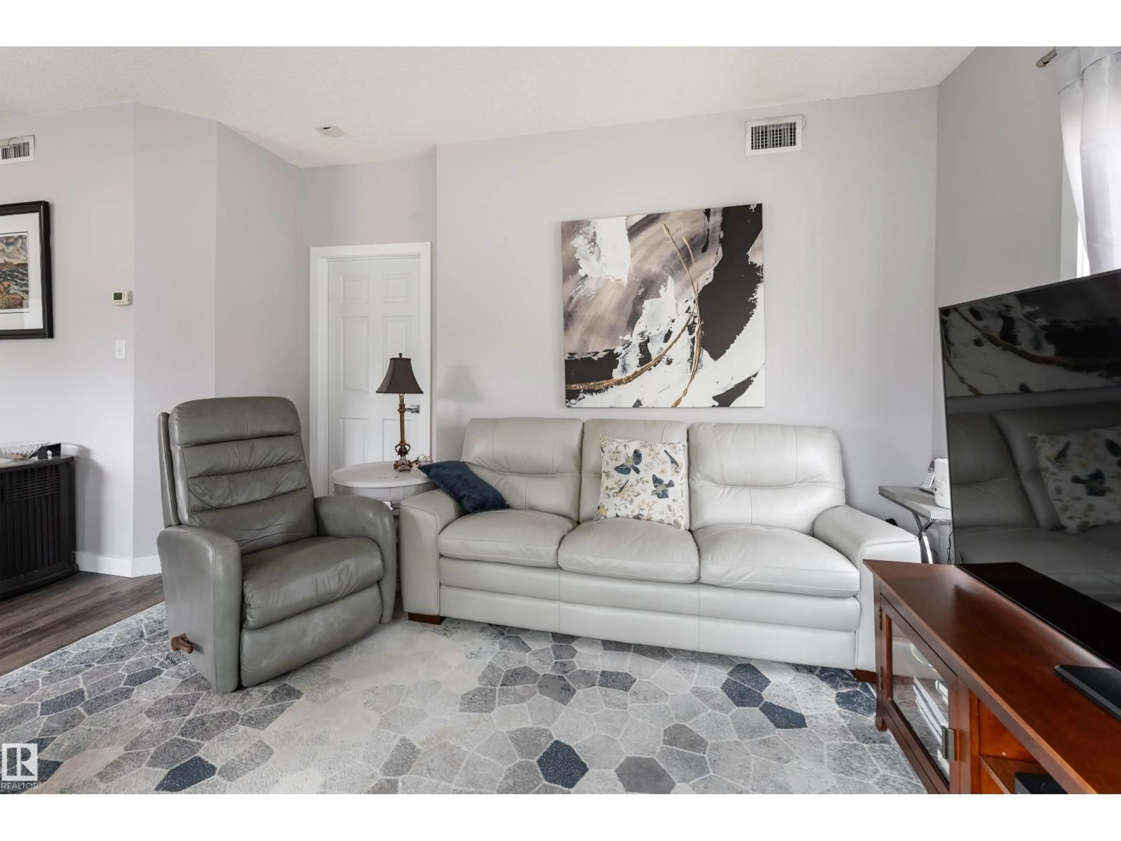 Living room with furniture, unknown for #104 - 11308 130 AV, Edmonton Alberta T5E6L2