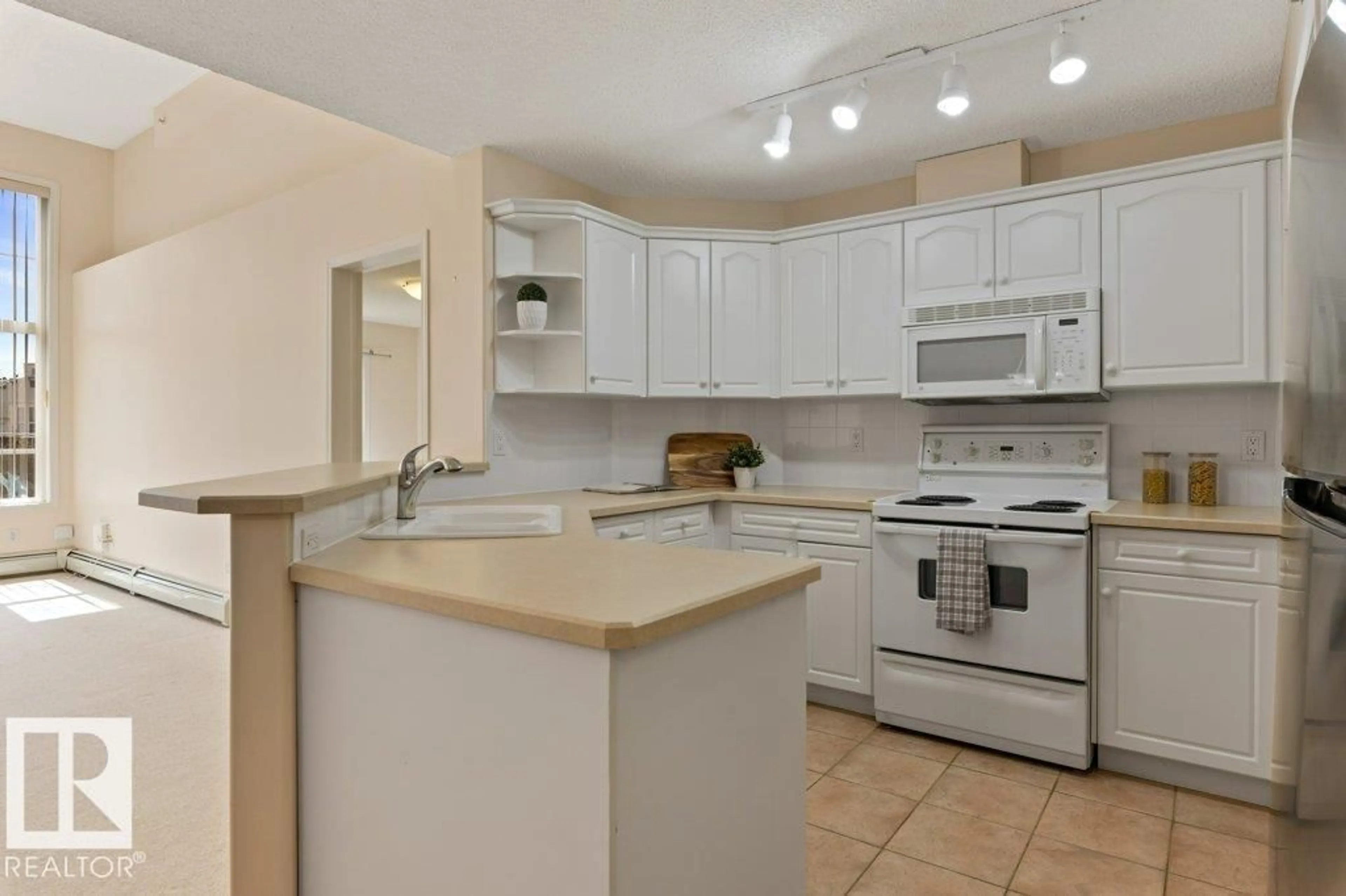 Standard kitchen, ceramic/tile floor for #412 - 9760 174 ST, Edmonton Alberta T5T6J4