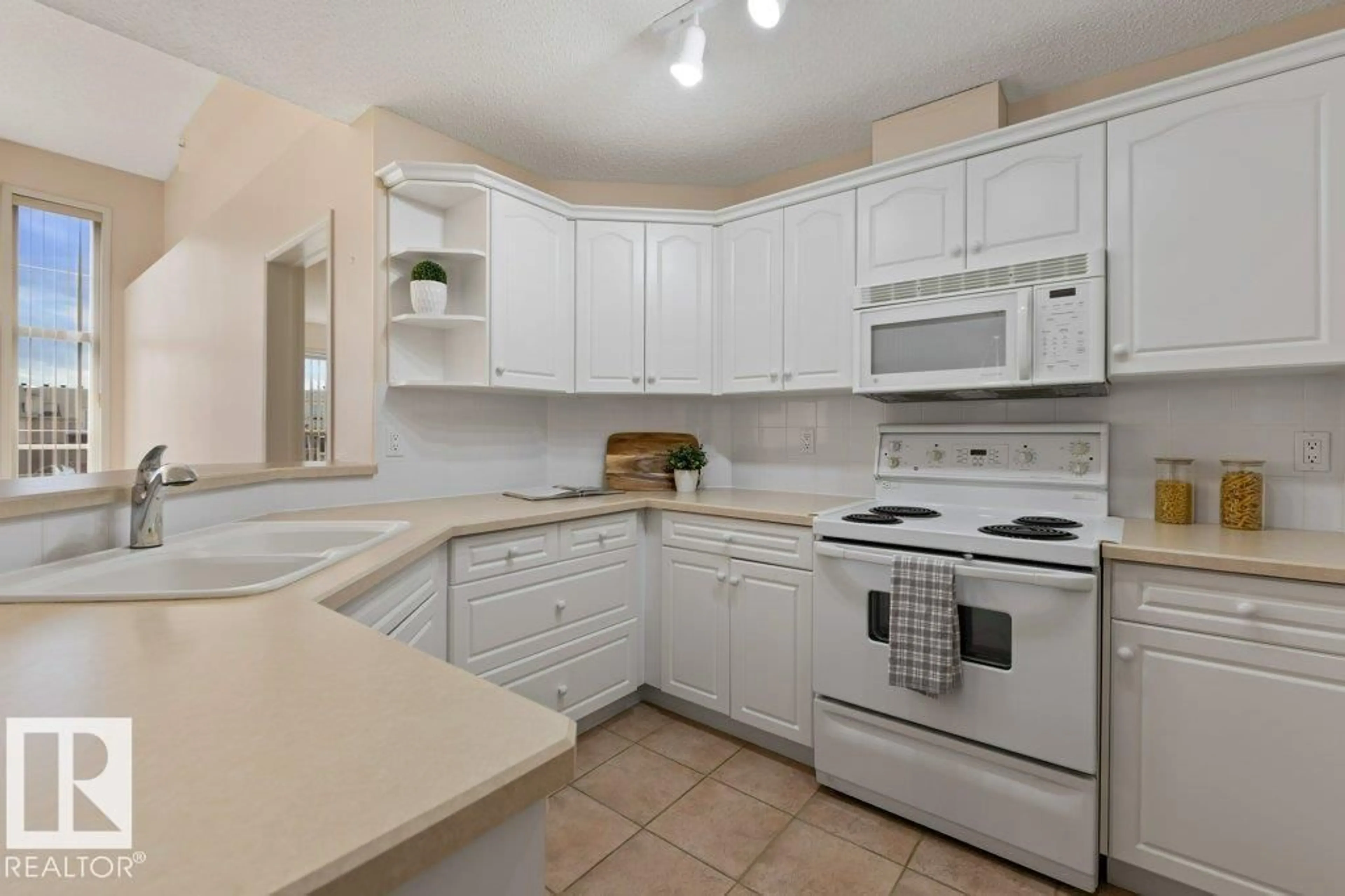 Standard kitchen, ceramic/tile floor for #412 - 9760 174 ST, Edmonton Alberta T5T6J4