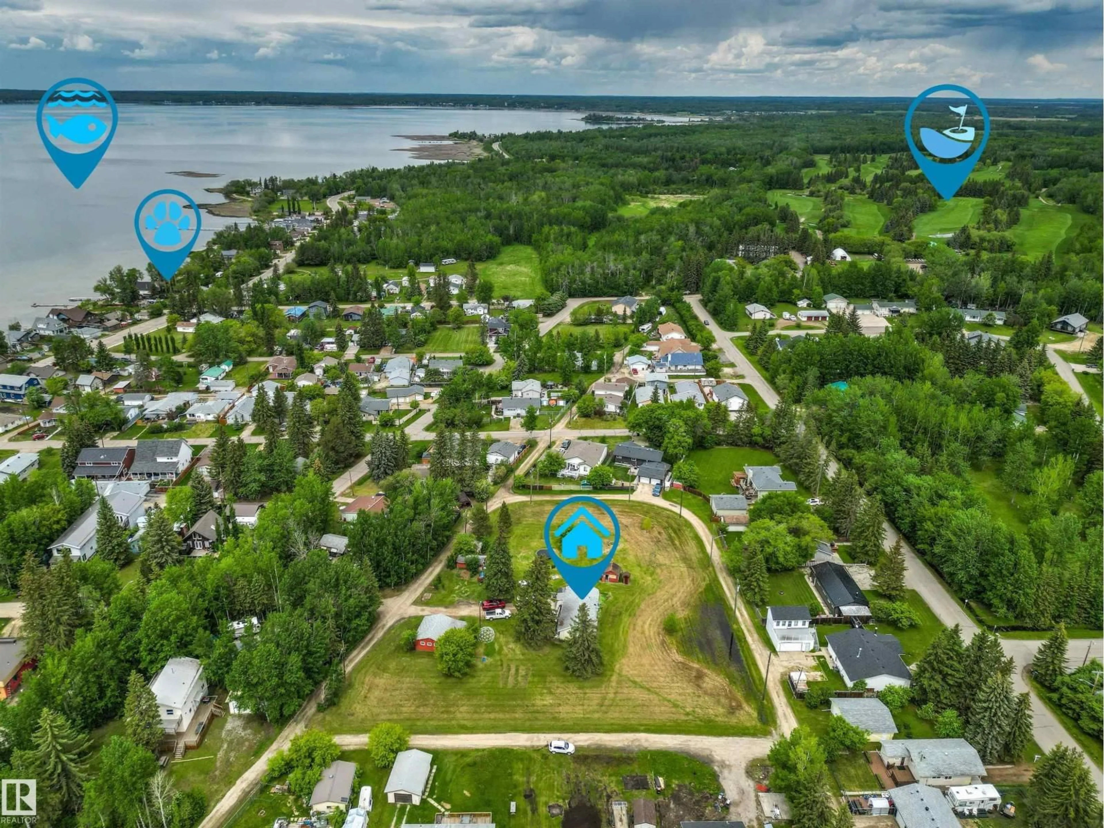 A pic from outside/outdoor area/front of a property/back of a property/a pic from drone, water/lake/river/ocean view for 4520 45 ST, Rural Lac Ste. Anne County Alberta T0E0E0
