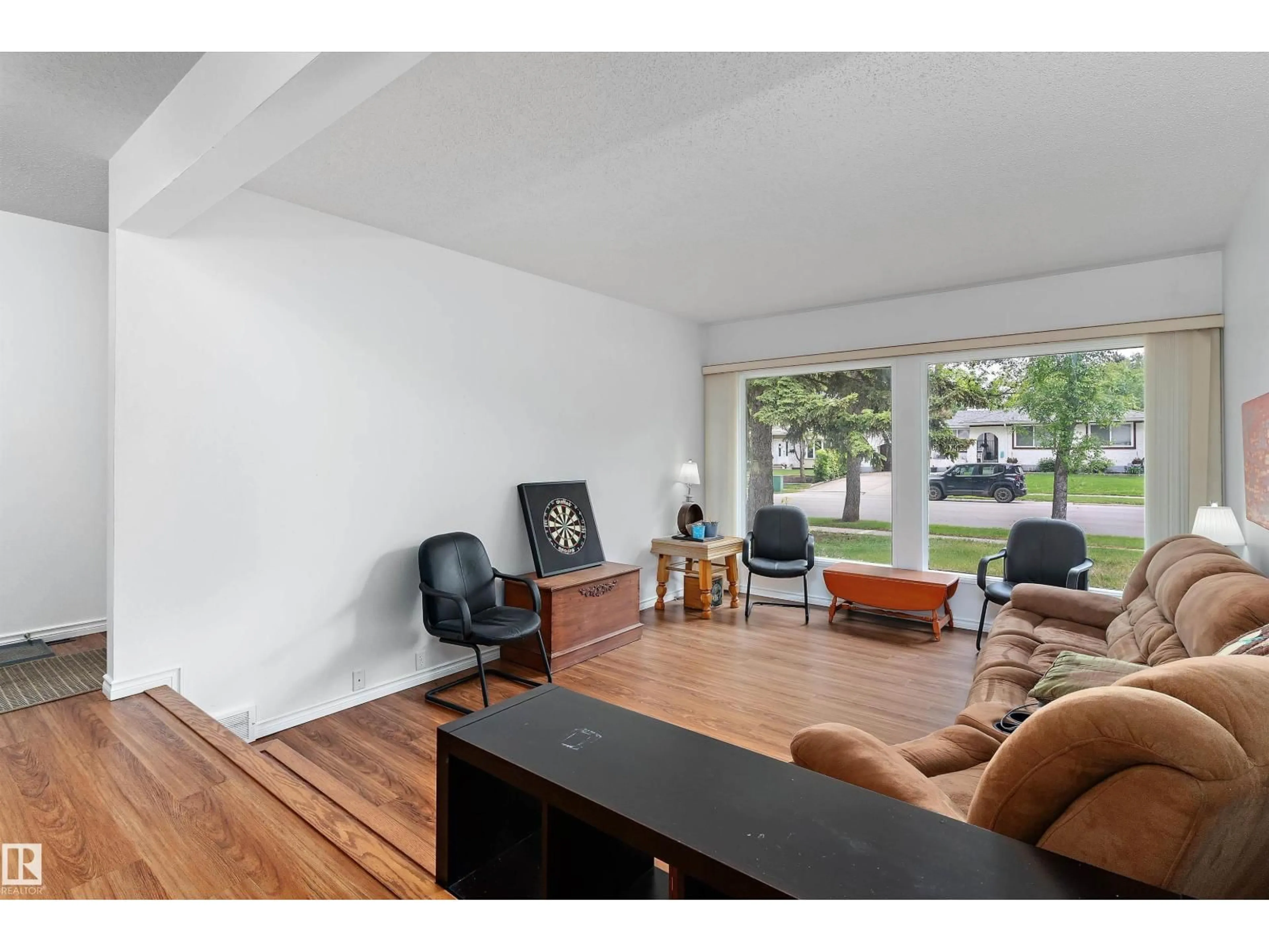 Living room with furniture, wood/laminate floor for 21 GRAHAM AV, St. Albert Alberta T8N1T4