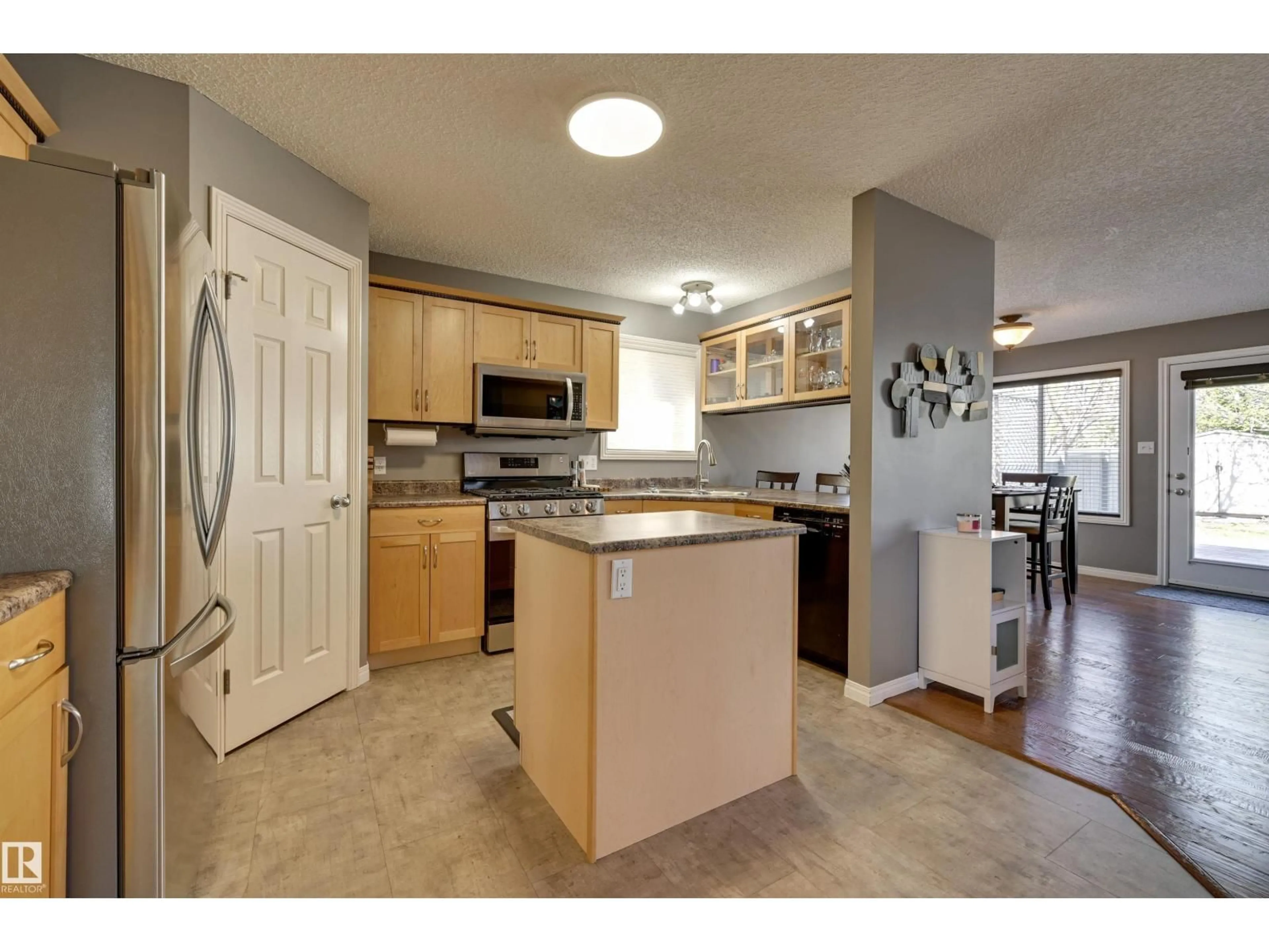 Open concept kitchen, unknown for 2208 BAKER CL, Edmonton Alberta T6W1G9