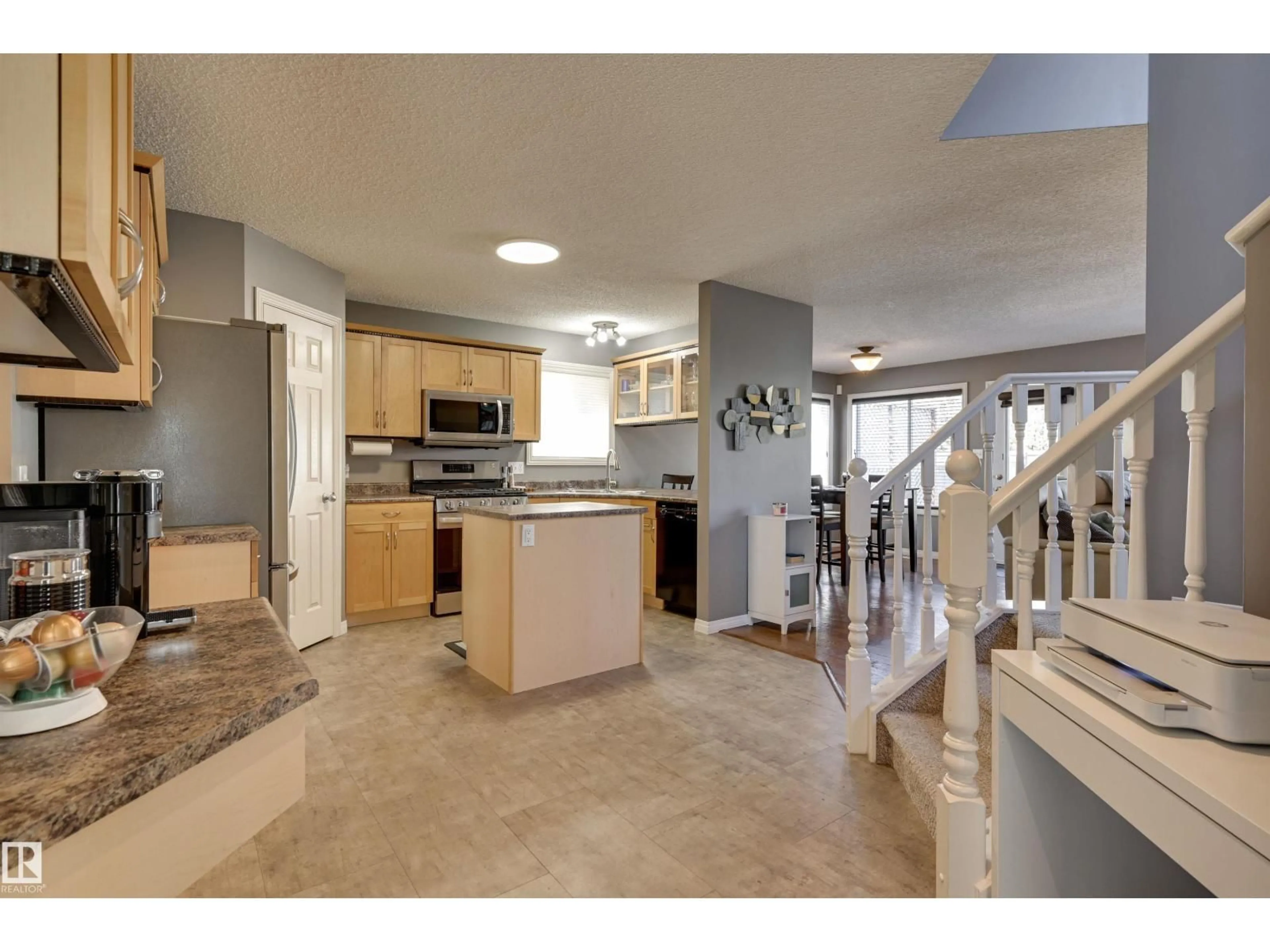 Open concept kitchen, ceramic/tile floor for 2208 BAKER CL, Edmonton Alberta T6W1G9