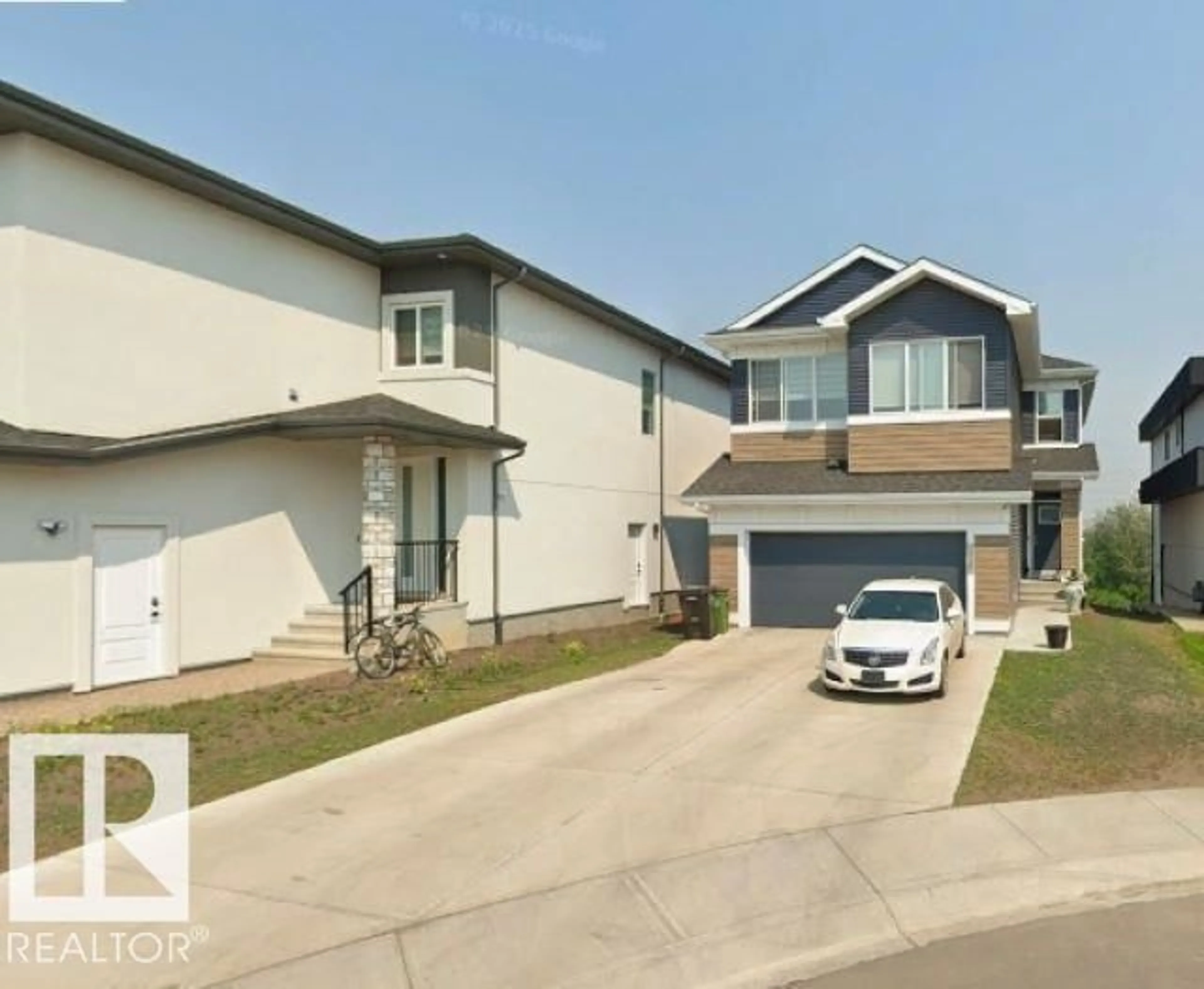 Home with vinyl exterior material, street for SW - 3918 3A AV, Edmonton Alberta T6X3A3