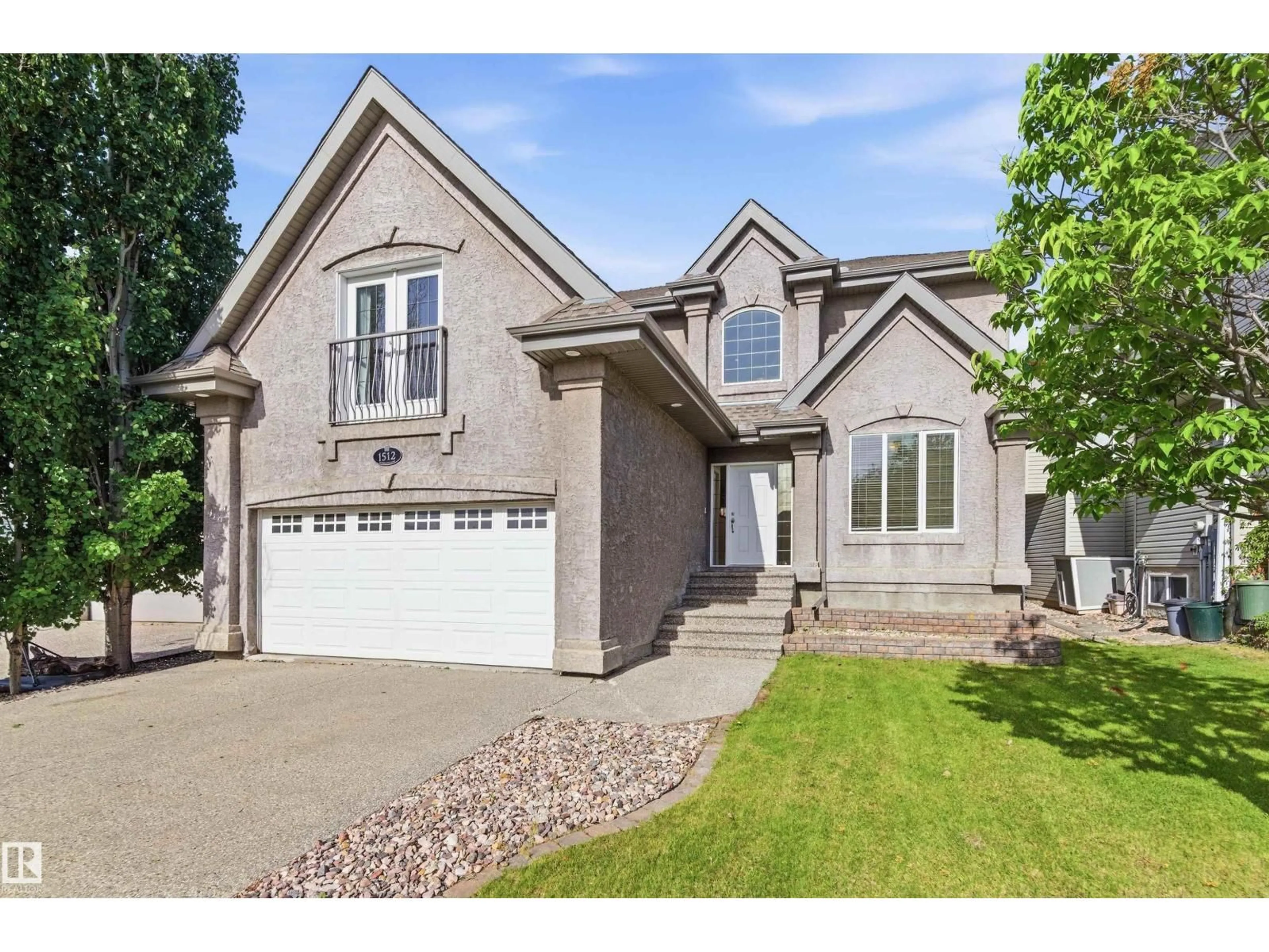 Home with brick exterior material, street for 1512 THOROGOOD CL, Edmonton Alberta T6R3K7