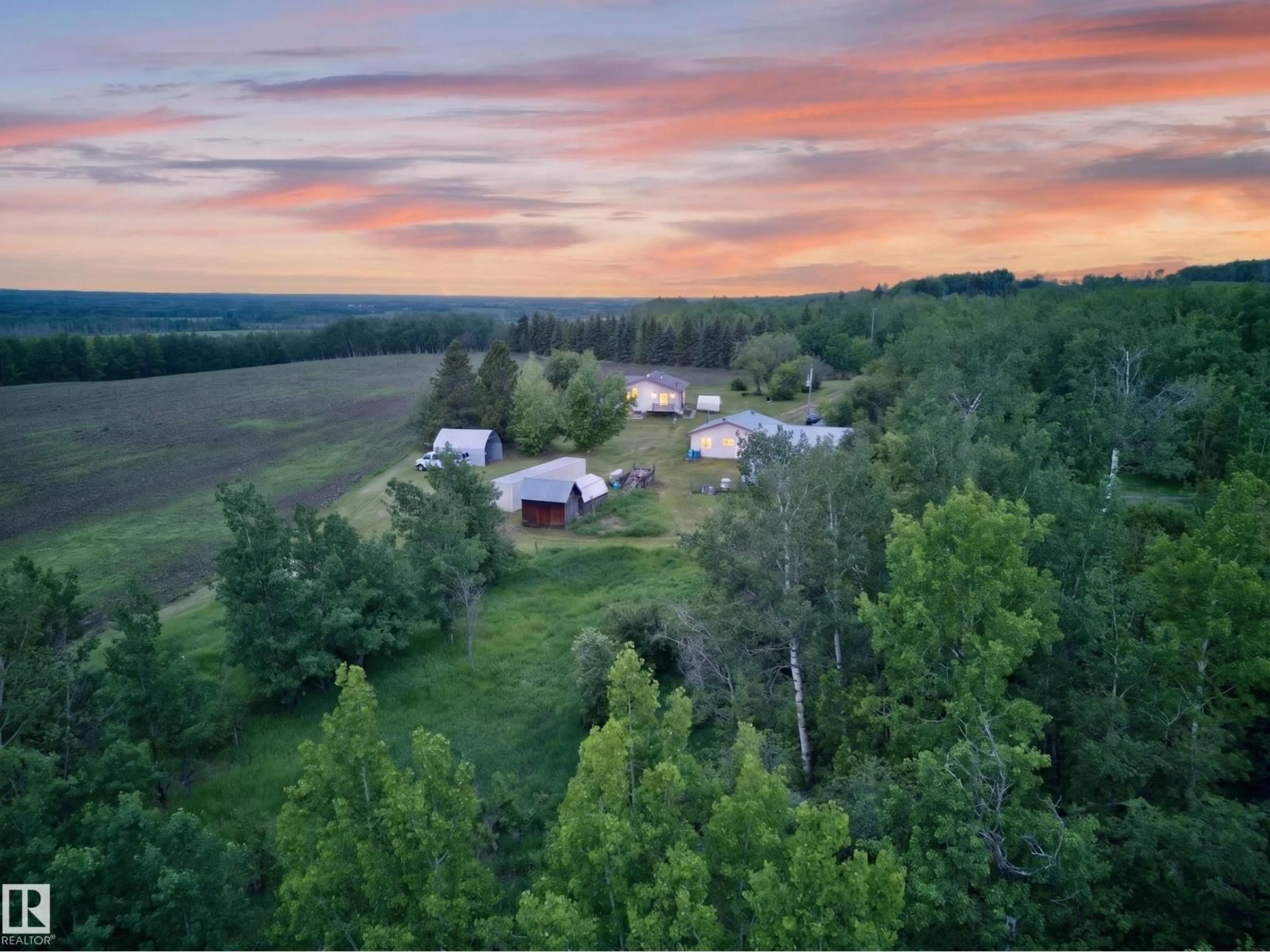 A pic from outside/outdoor area/front of a property/back of a property/a pic from drone, mountain view for 1415 HWY 37, Rural Lac Ste. Anne County Alberta T0E1V0