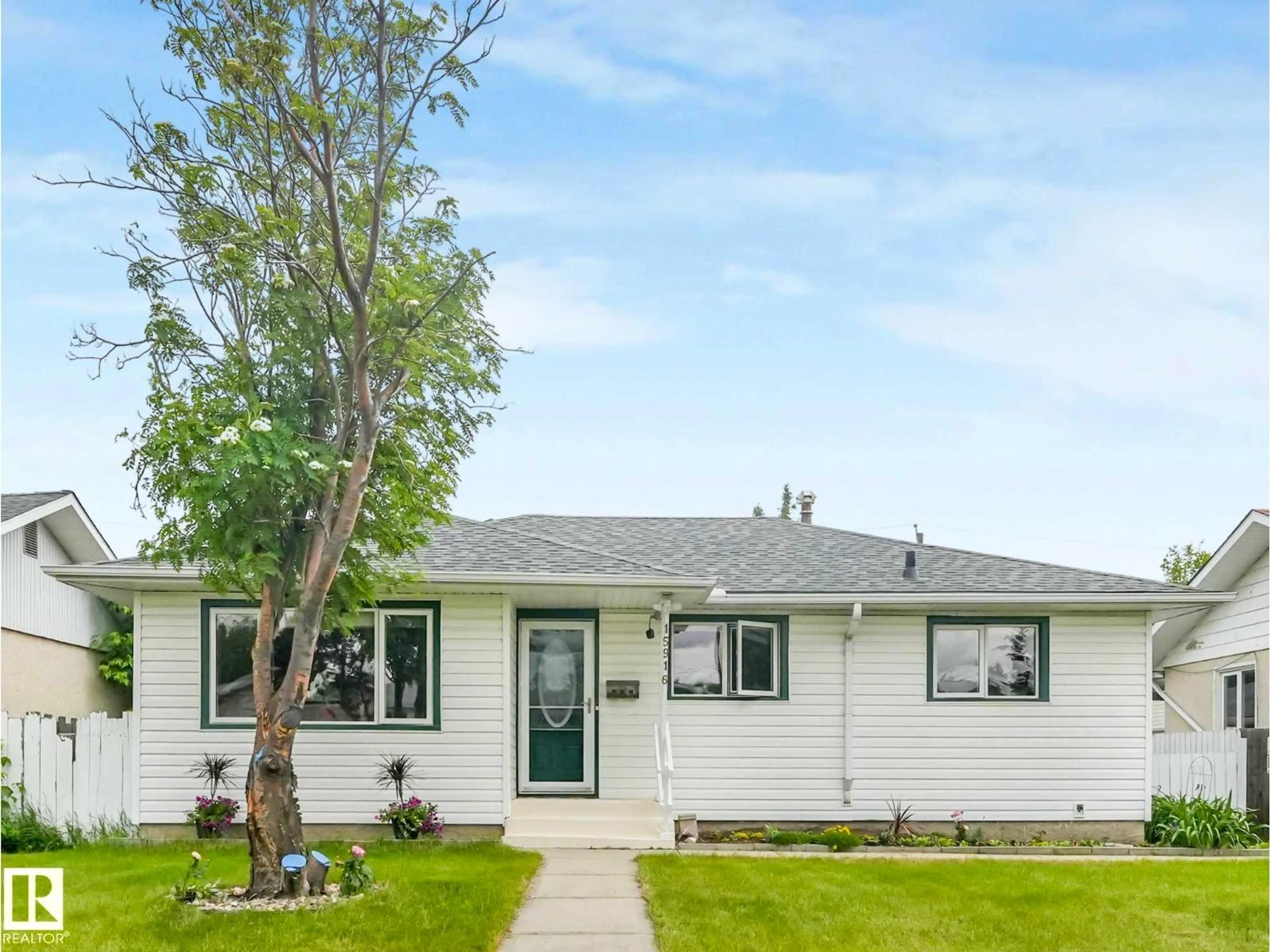 Home with vinyl exterior material, street for NW - 15916 88B AV, Edmonton Alberta T5R4N7
