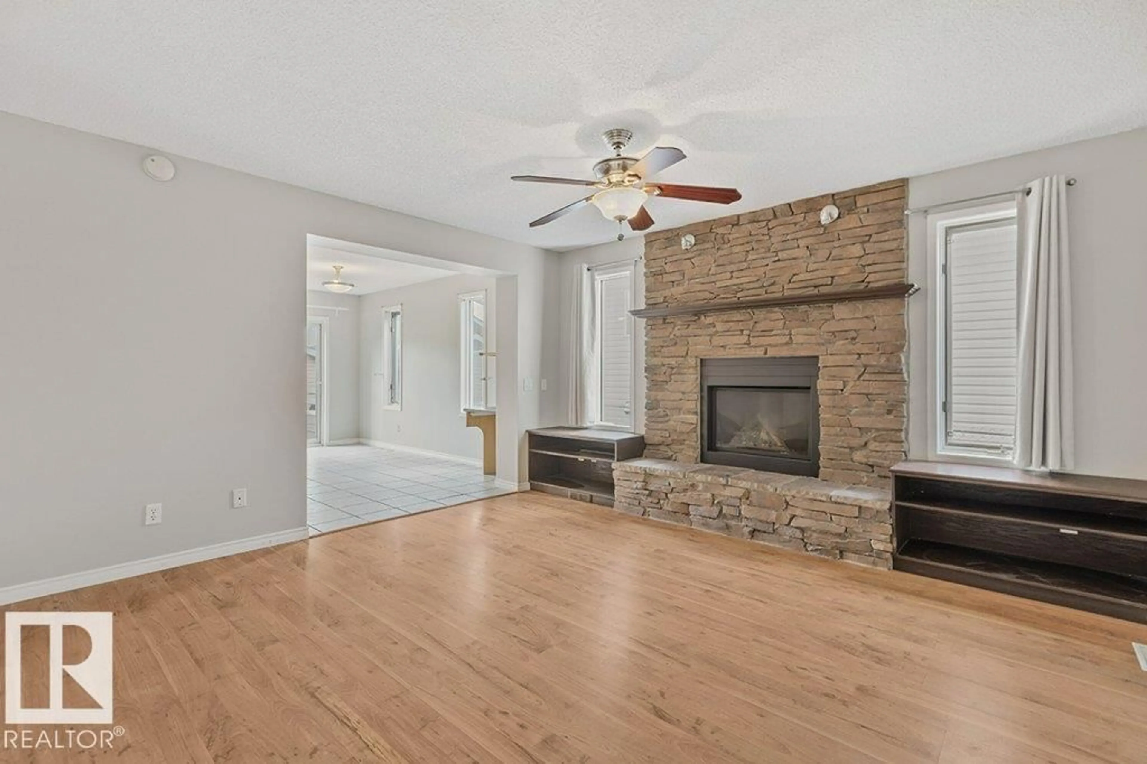 Living room with furniture, wood/laminate floor for 30 HARVEST BA, Stony Plain Alberta T7Z2A7