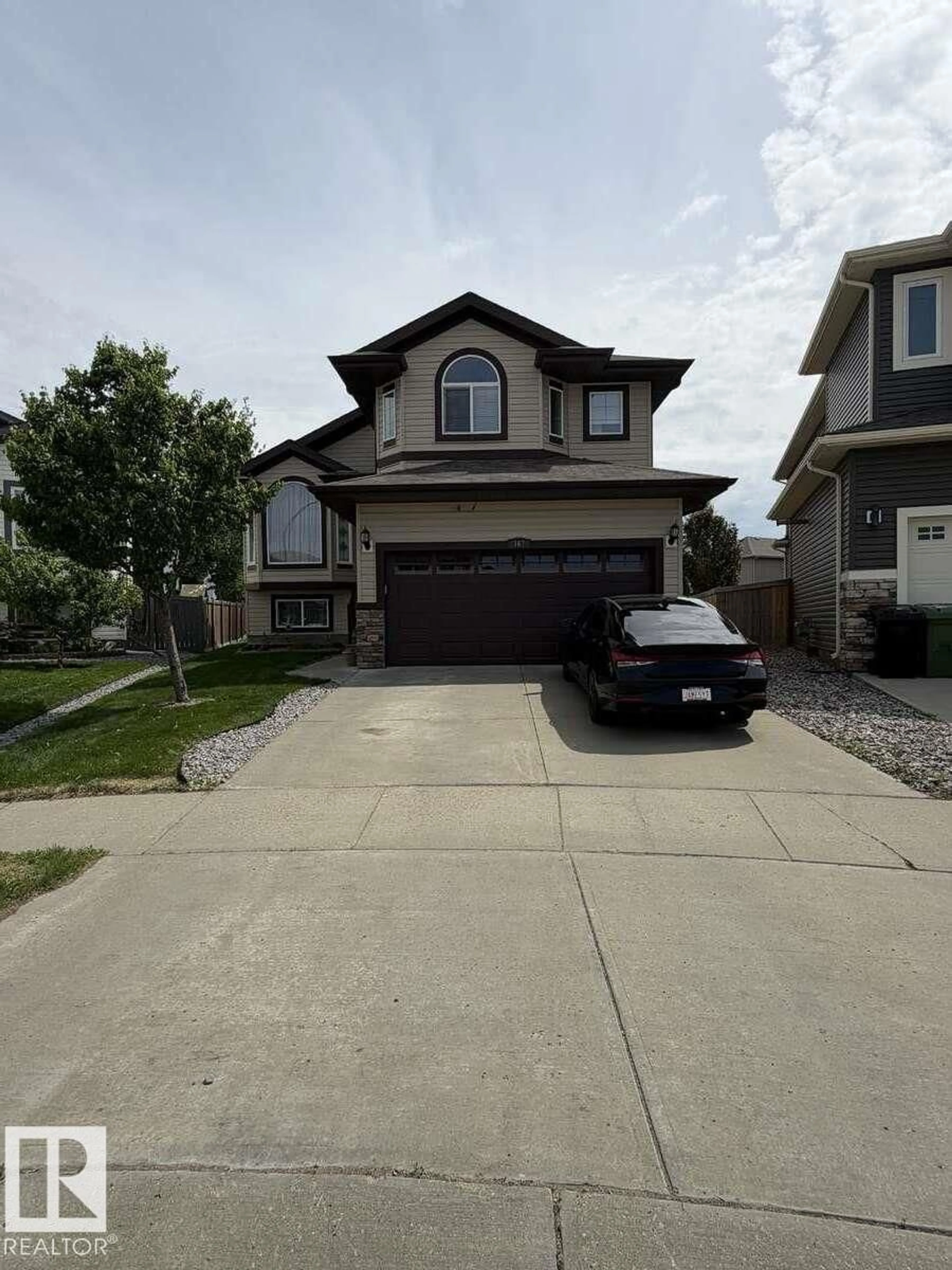 Home with vinyl exterior material, street for 167 SONORA, Fort Saskatchewan Alberta T8L0H6