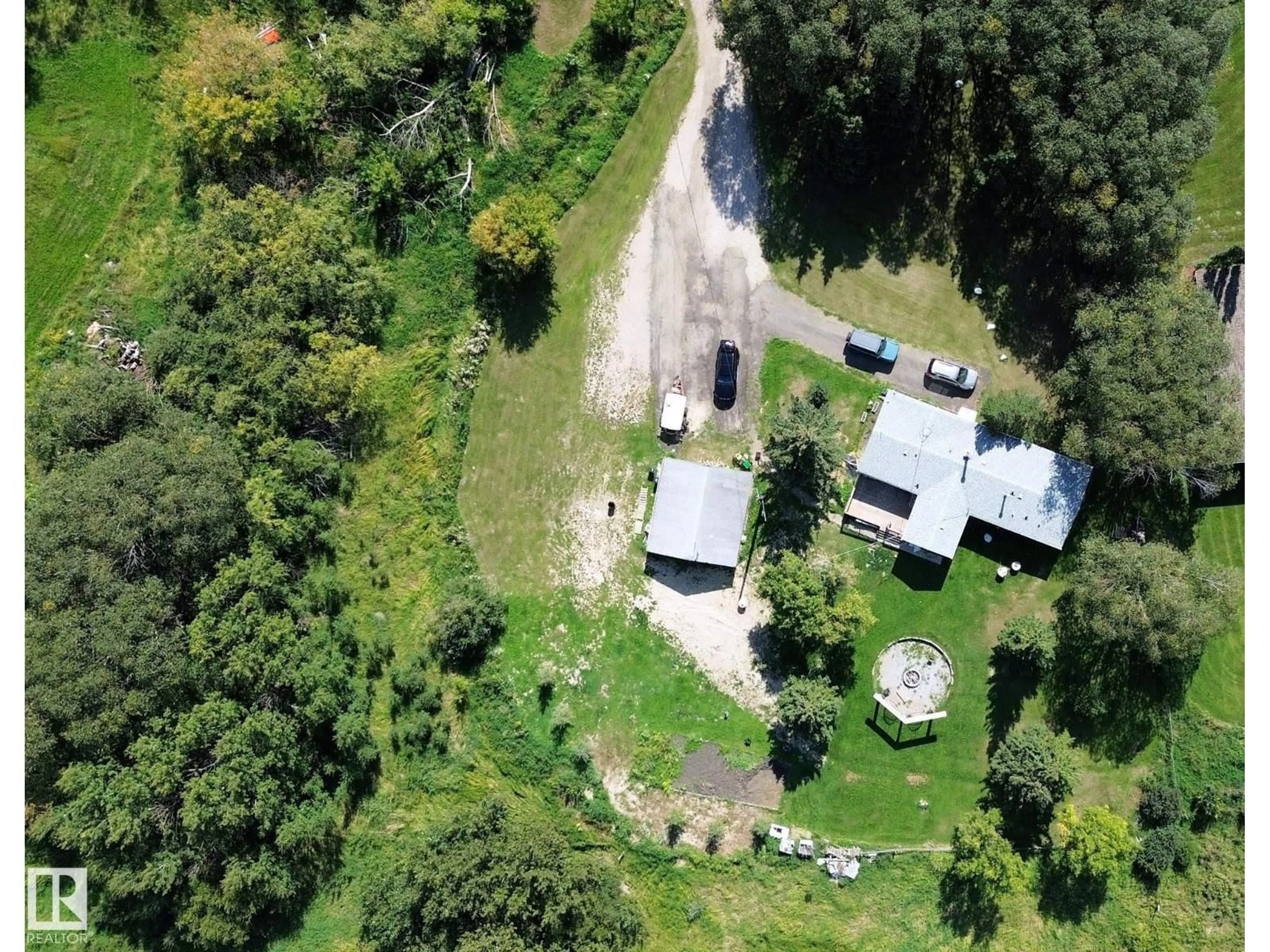 A pic from outside/outdoor area/front of a property/back of a property/a pic from drone, forest/trees view for 3054 28 AV, Edmonton Alberta T6X1A5