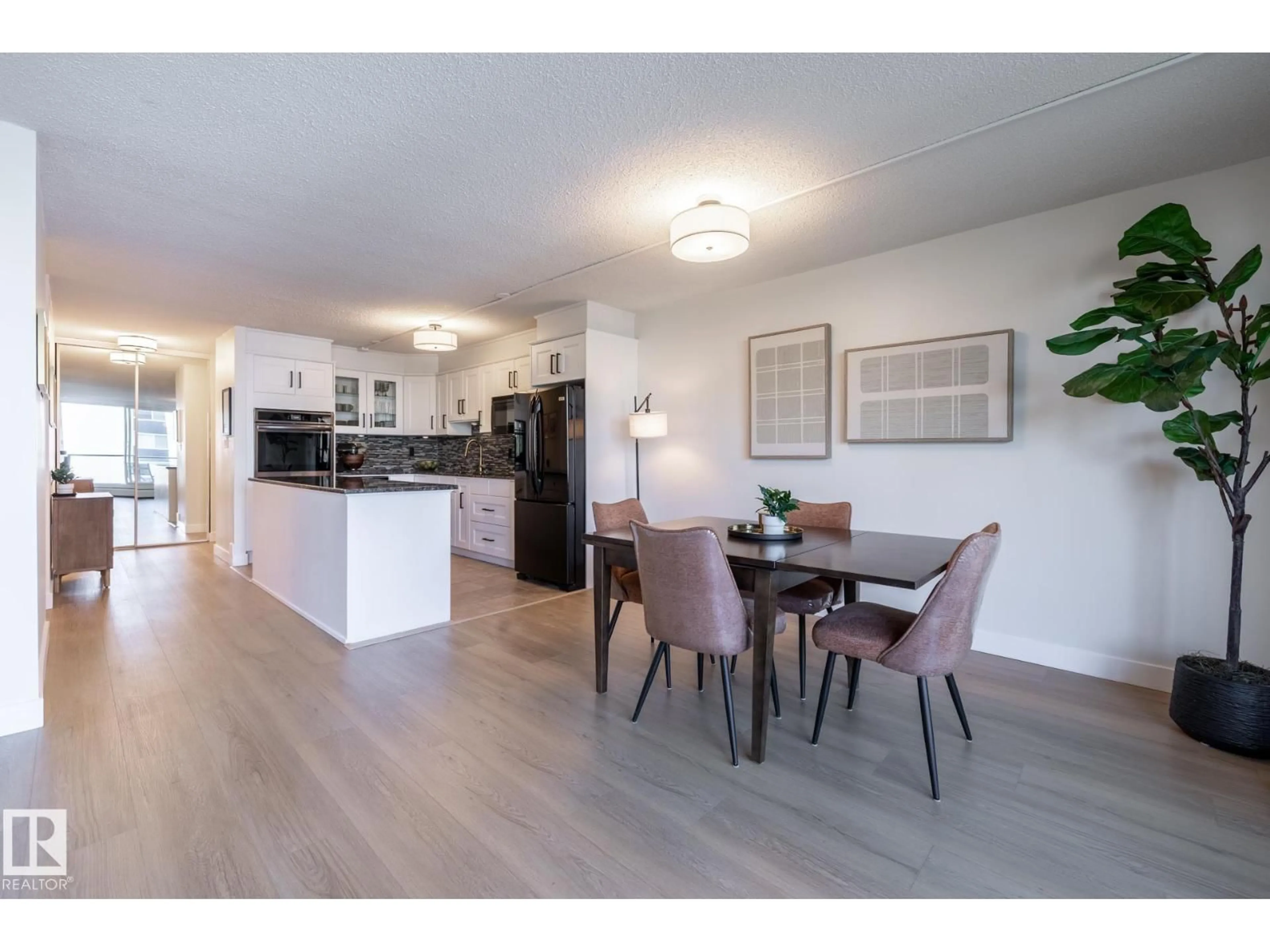 Open concept kitchen, wood/laminate floor for 807 - 10011 116 ST, Edmonton Alberta T5K1V4