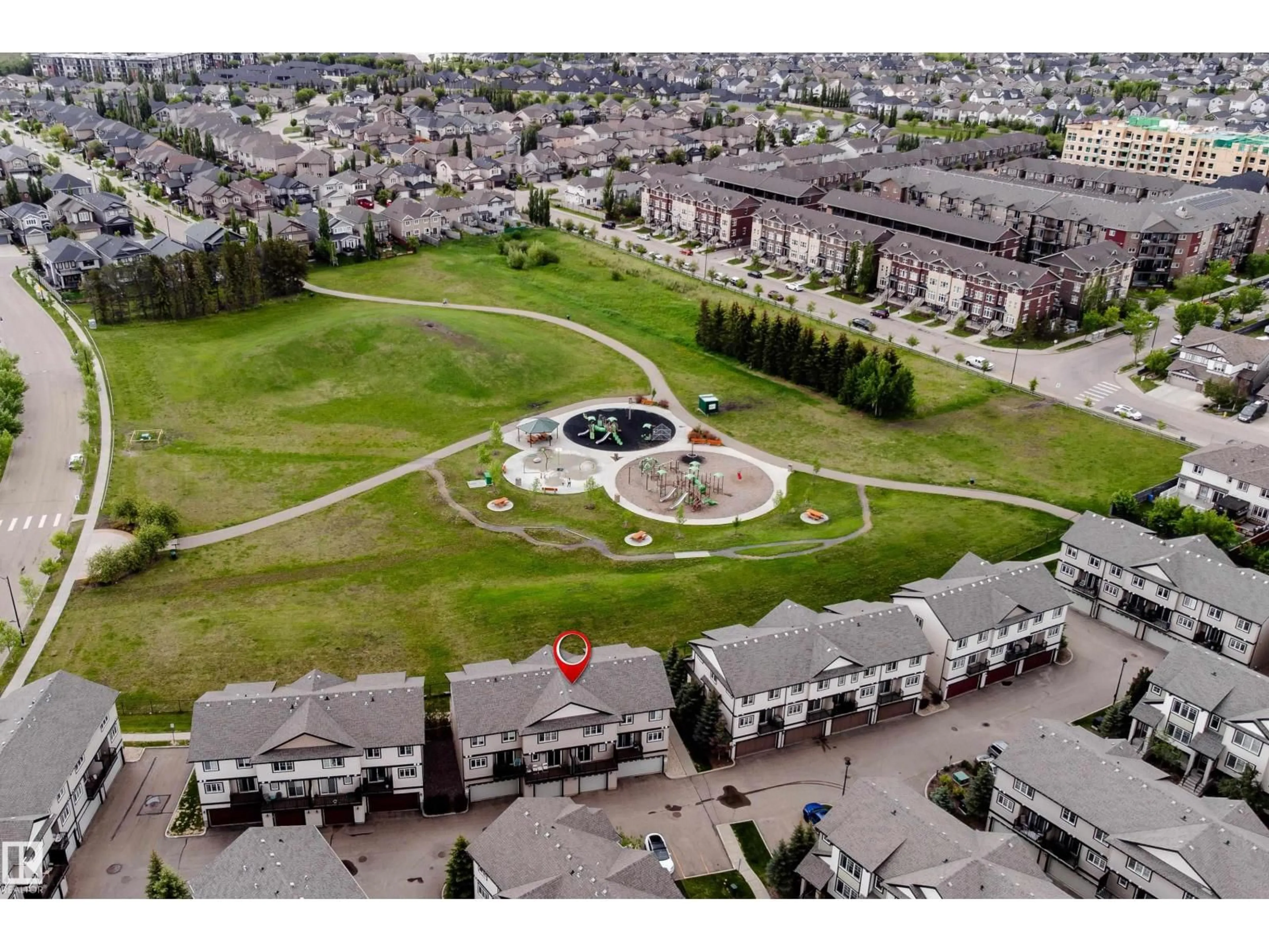 A pic from outside/outdoor area/front of a property/back of a property/a pic from drone, mountain view for 1776 - 12 CUNNINGHAM WY, Edmonton Alberta T6W2J5