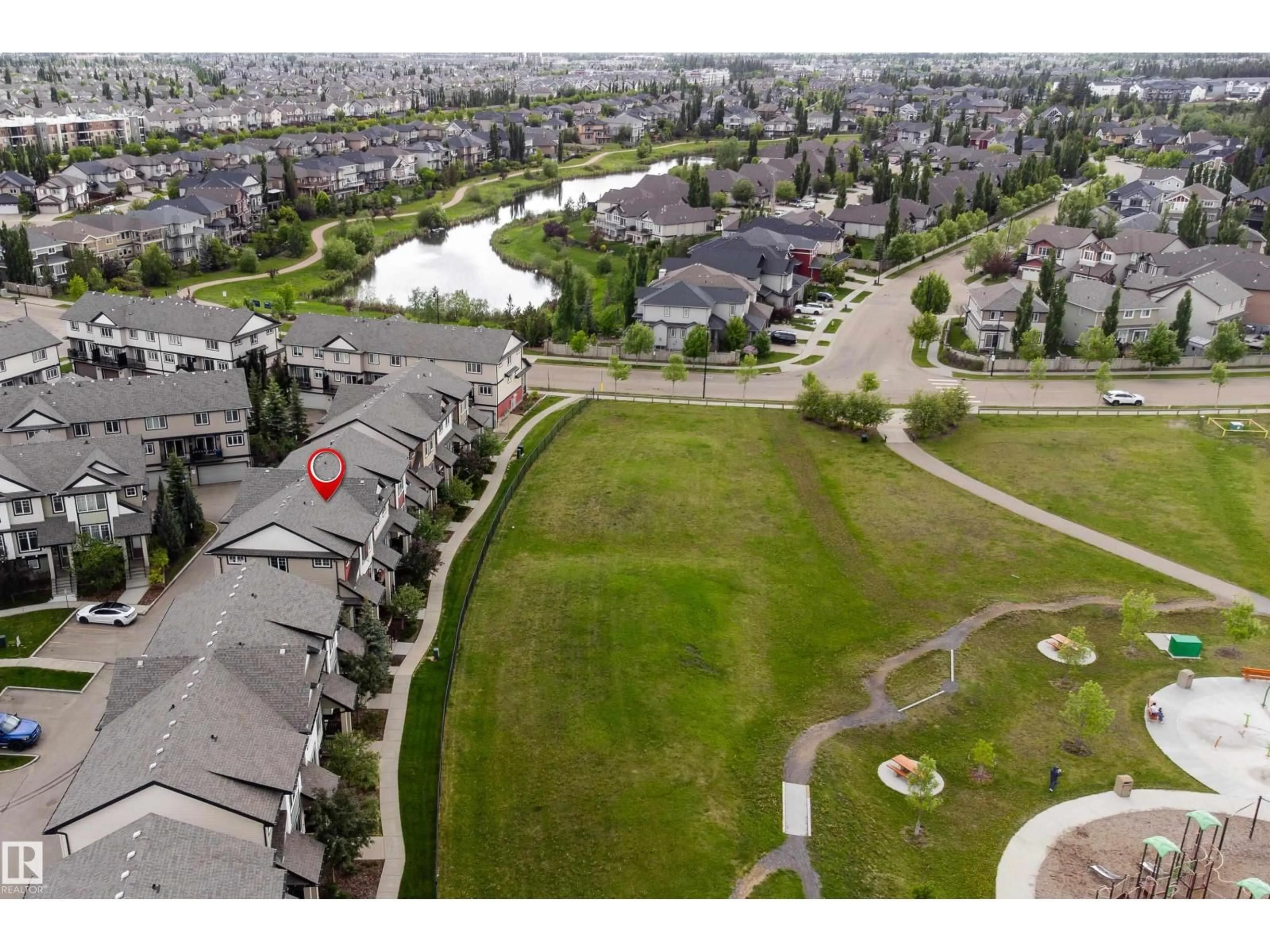 A pic from outside/outdoor area/front of a property/back of a property/a pic from drone, unknown for 1776 - 12 CUNNINGHAM WY, Edmonton Alberta T6W2J5