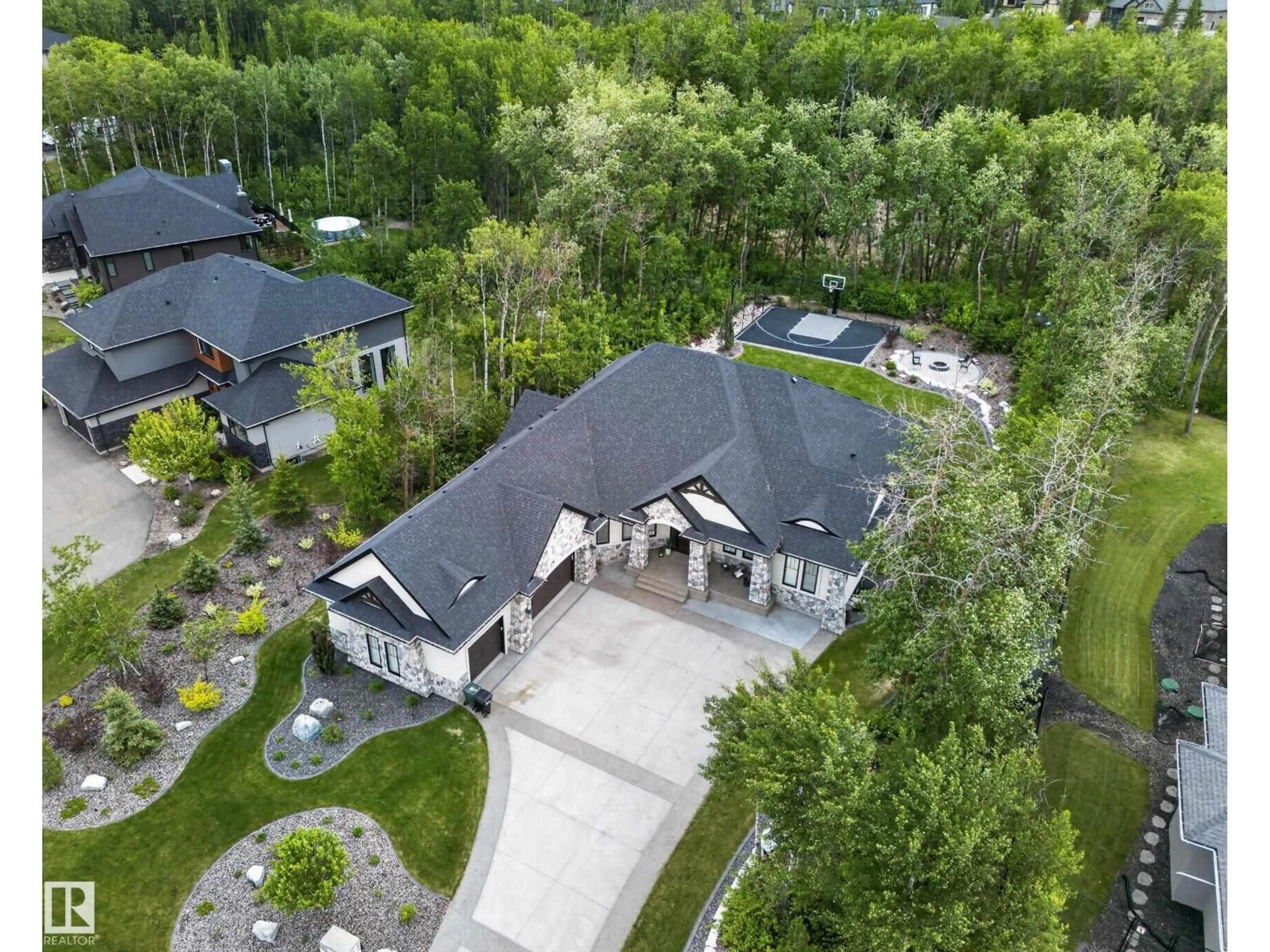 A pic from outside/outdoor area/front of a property/back of a property/a pic from drone, unknown for 87 - 52367 RGE ROAD 223, Rural Strathcona County Alberta T8C1A8