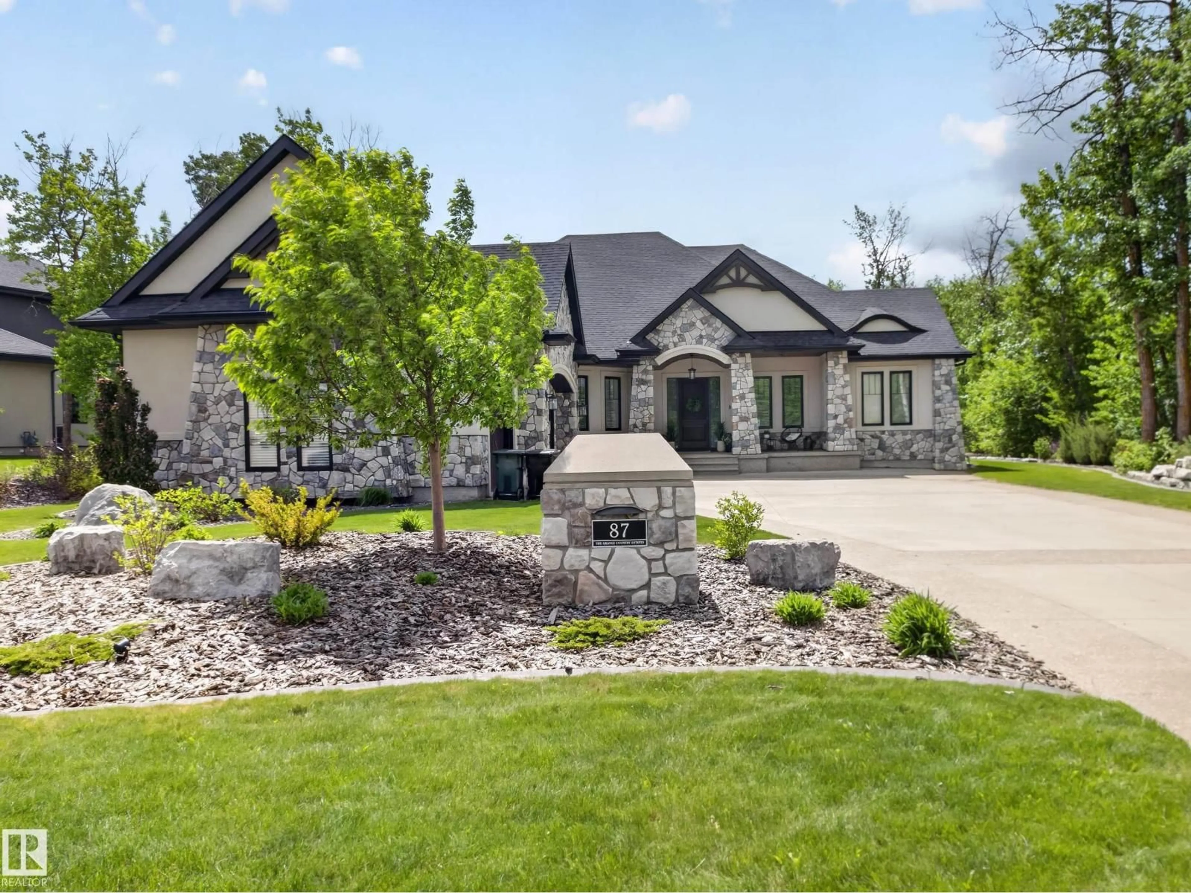 Home with brick exterior material, street for 87 - 52367 RGE ROAD 223, Rural Strathcona County Alberta T8C1A8