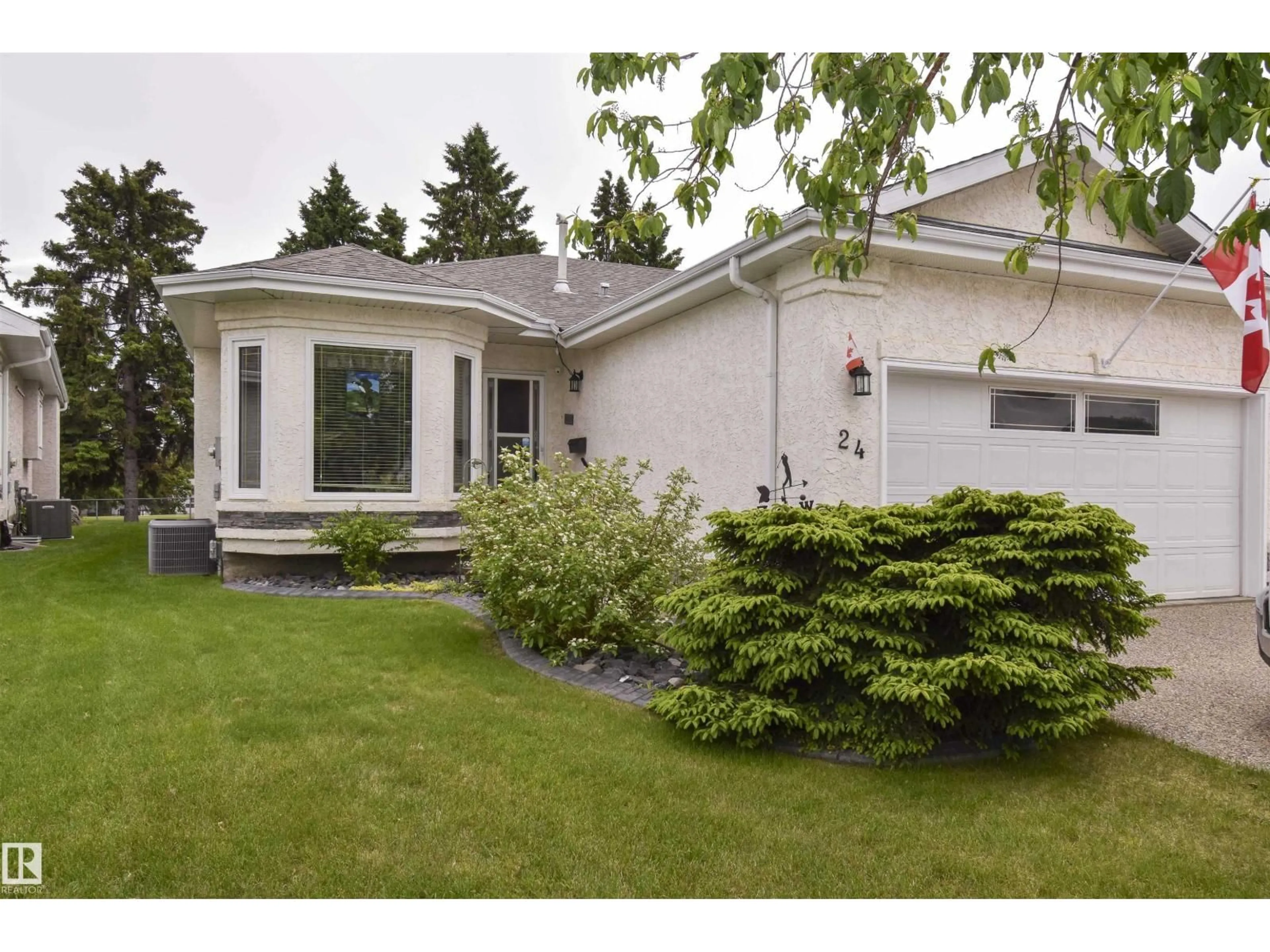 Home with vinyl exterior material, street for 24 LONGVIEW PL, Spruce Grove Alberta T7X3Y6