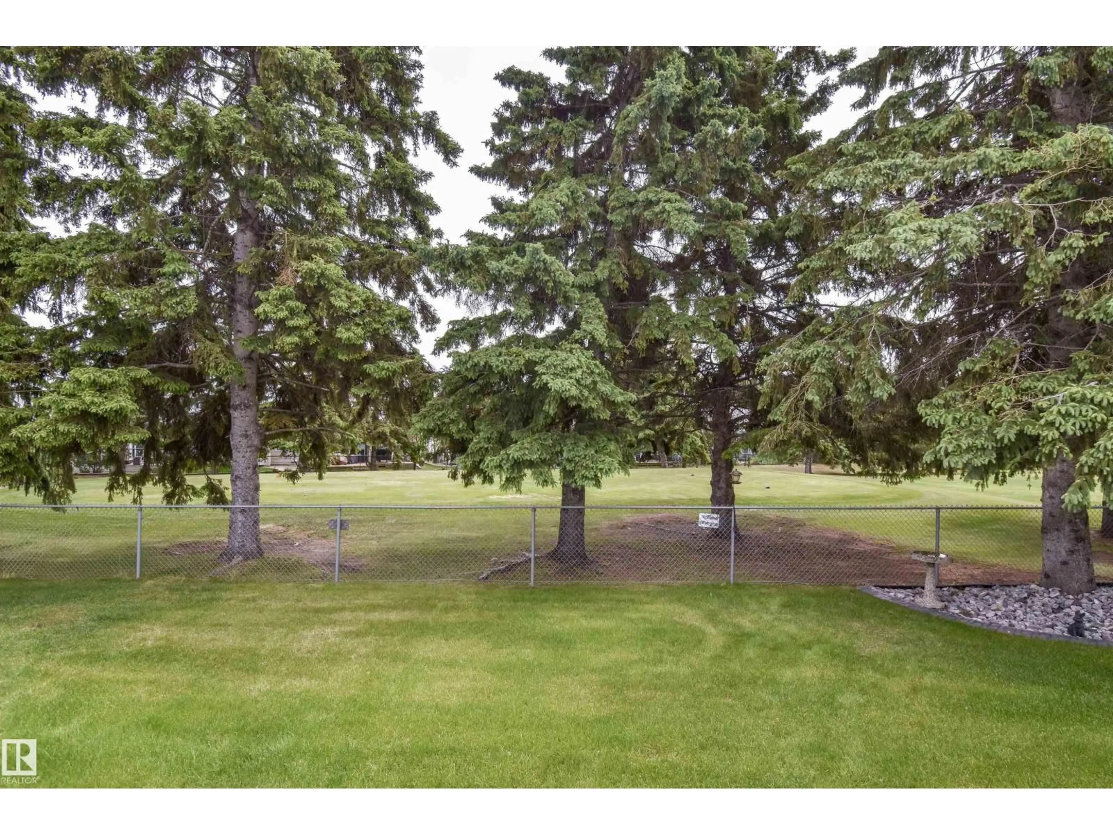 A pic from outside/outdoor area/front of a property/back of a property/a pic from drone, forest/trees view for 24 LONGVIEW PL, Spruce Grove Alberta T7X3Y6