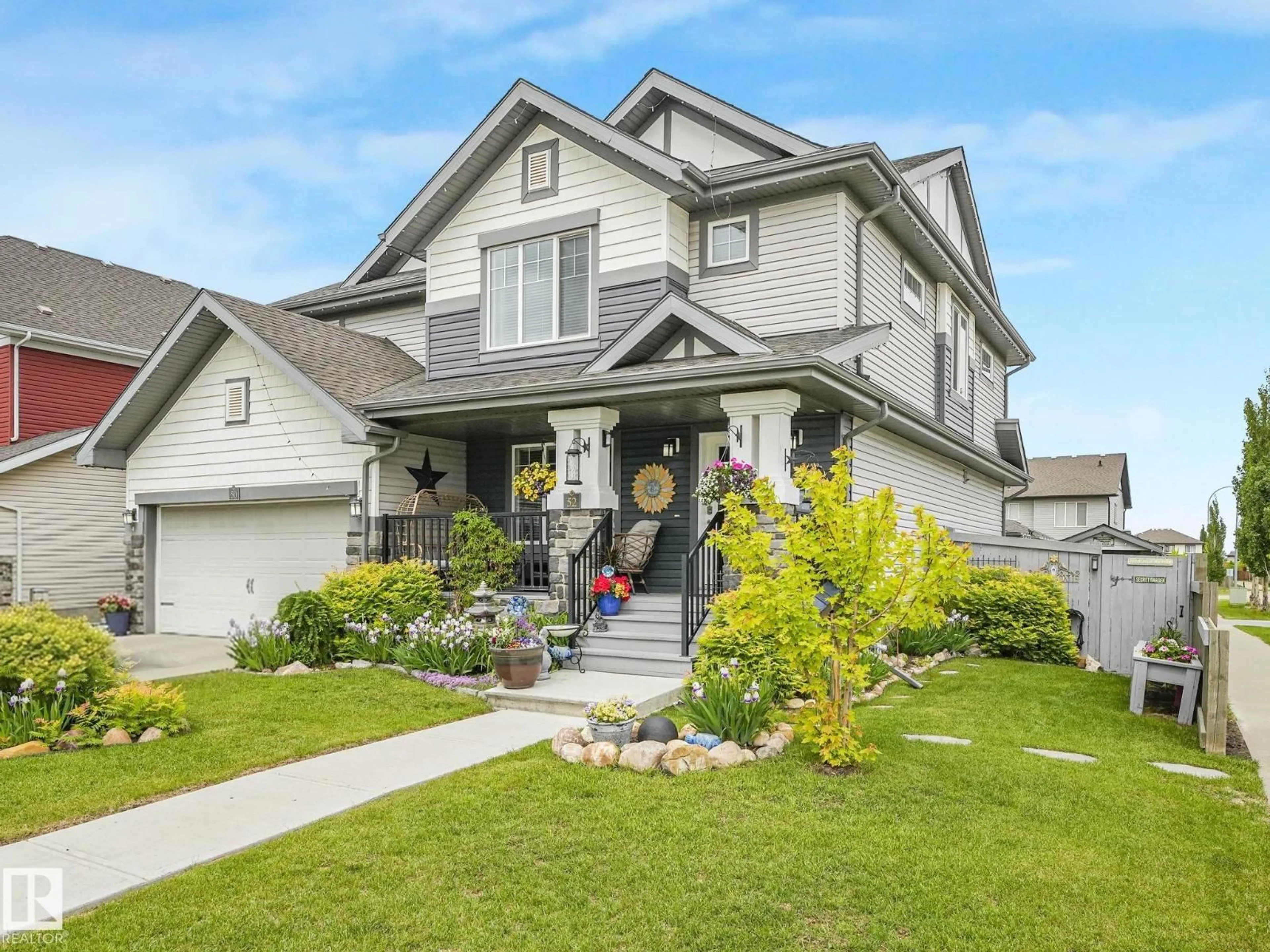 Home with vinyl exterior material, street for 52 SIERRA WD, Fort Saskatchewan Alberta T8L0T3