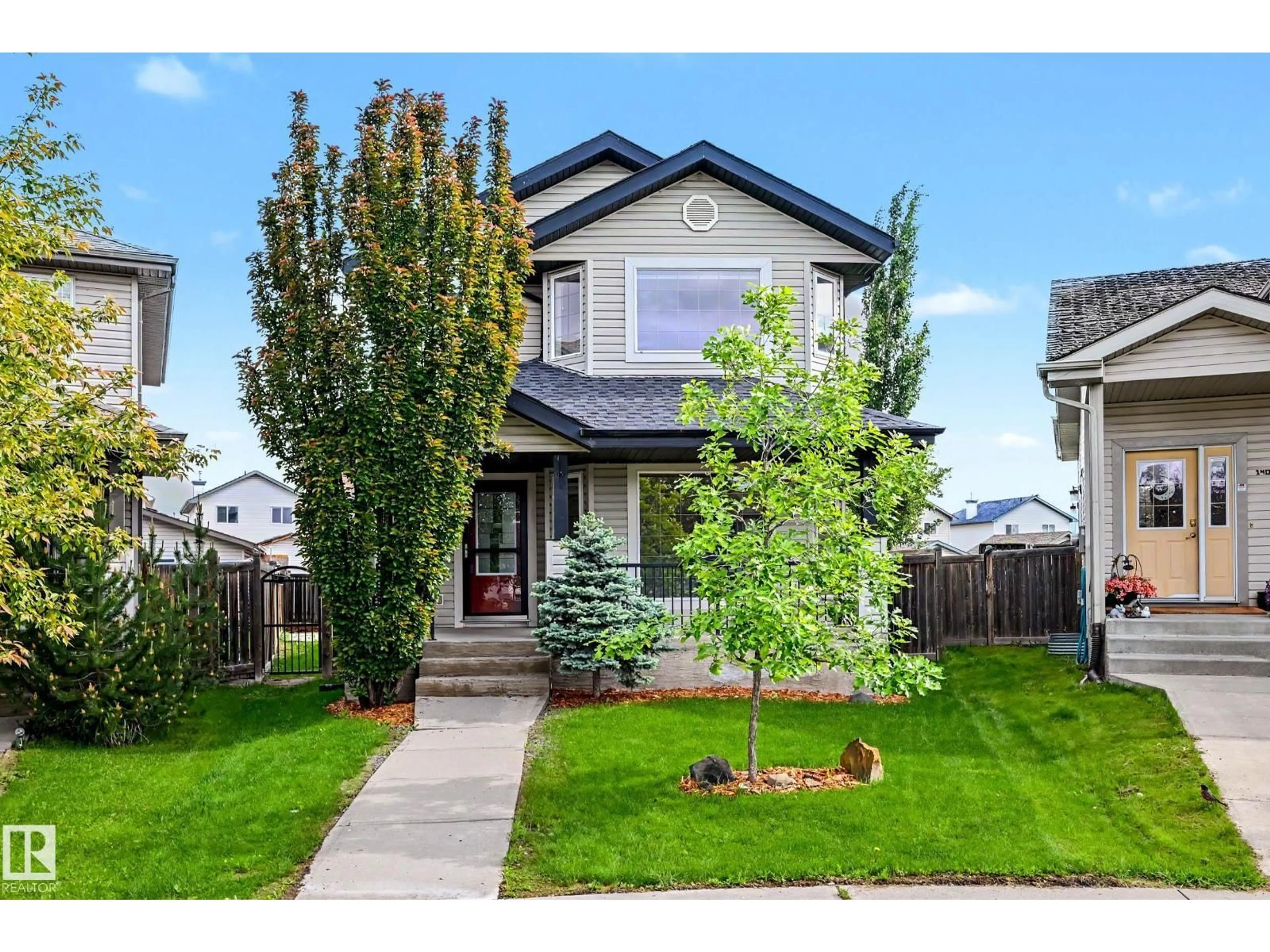 Home with vinyl exterior material, street for 14014 158A AV, Edmonton Alberta T6V1V7