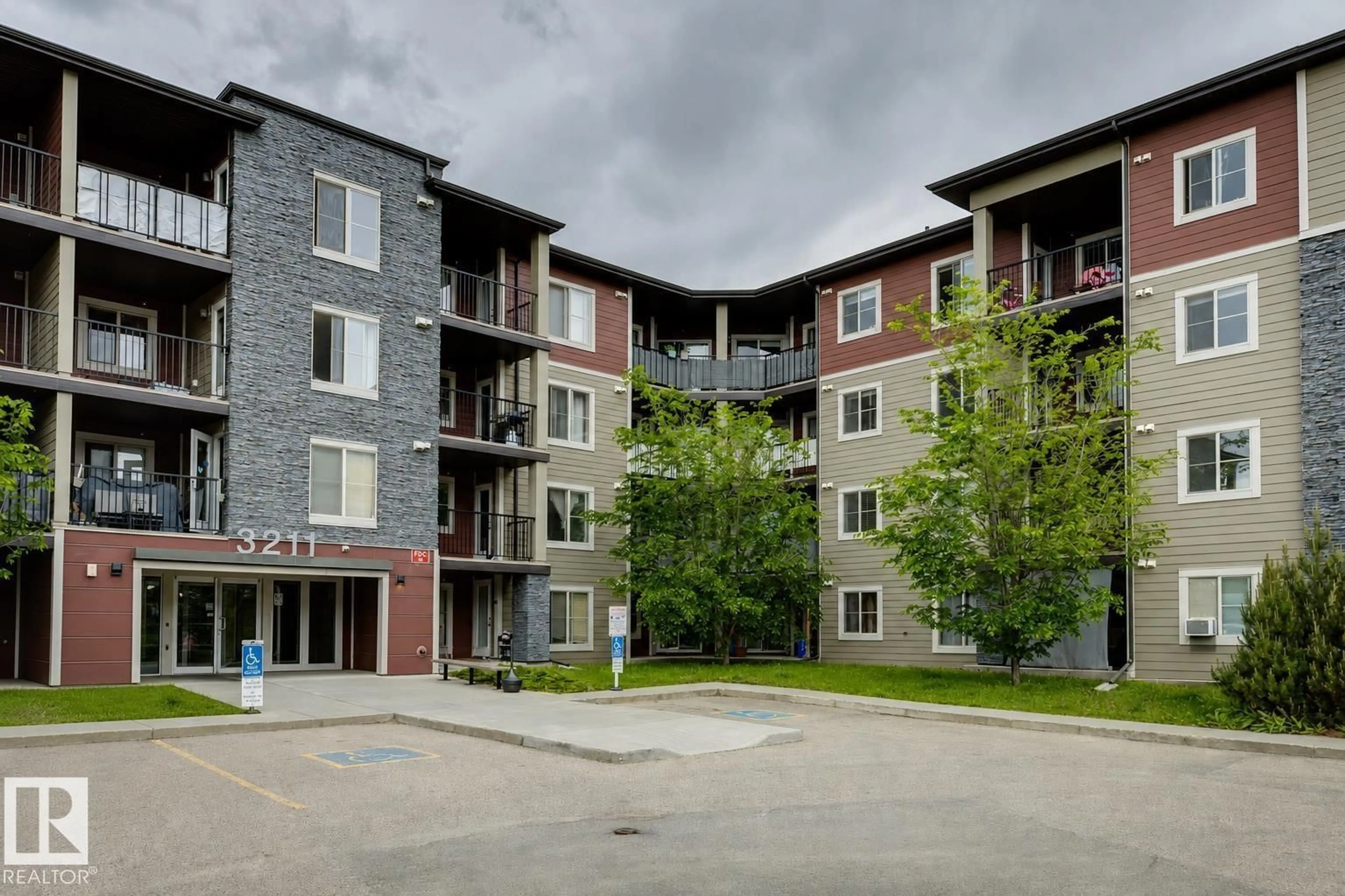 A pic from outside/outdoor area/front of a property/back of a property/a pic from drone, building for #112 - 3211 JAMES MOWATT TR, Edmonton Alberta T6W3L6