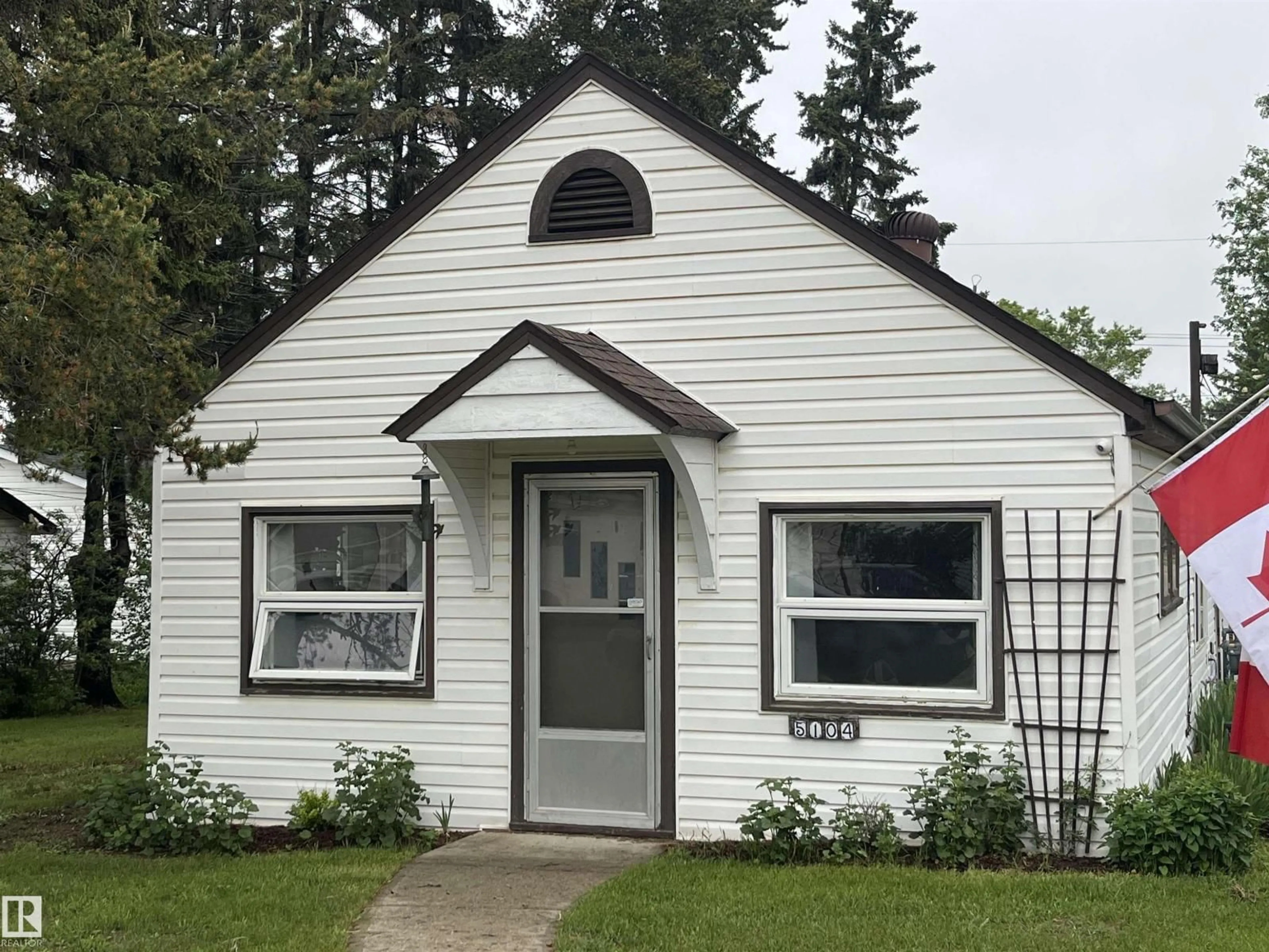 Home with vinyl exterior material, street for 5104 55 AV, Tofield Alberta T0B4J0