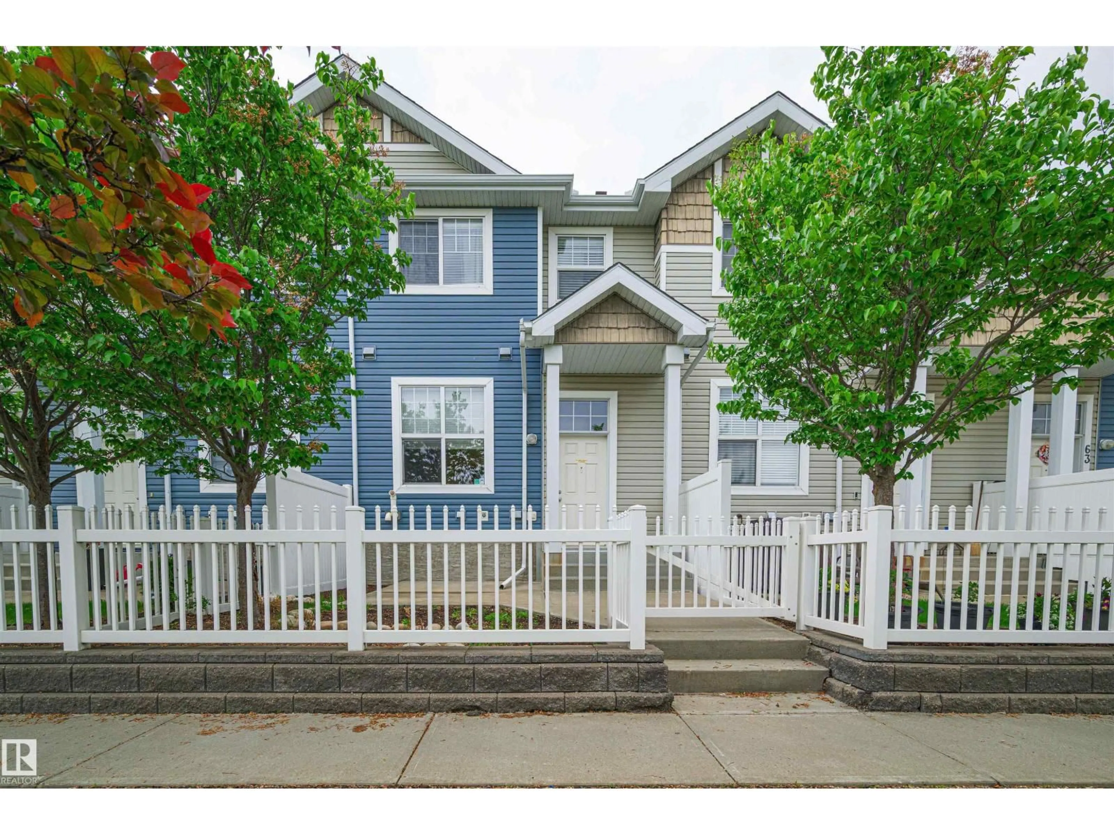 Home with vinyl exterior material, street for #61 - 2051 TOWNE CENTRE BV, Edmonton Alberta T6R0G8