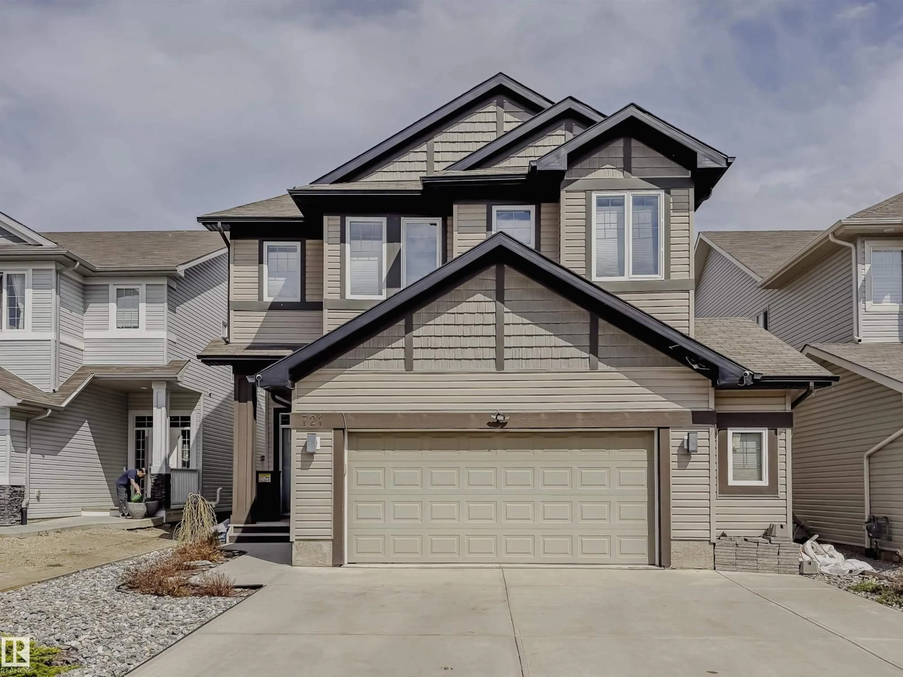 Home with vinyl exterior material, street for NW - 721 178A ST, Edmonton Alberta T6W2S6