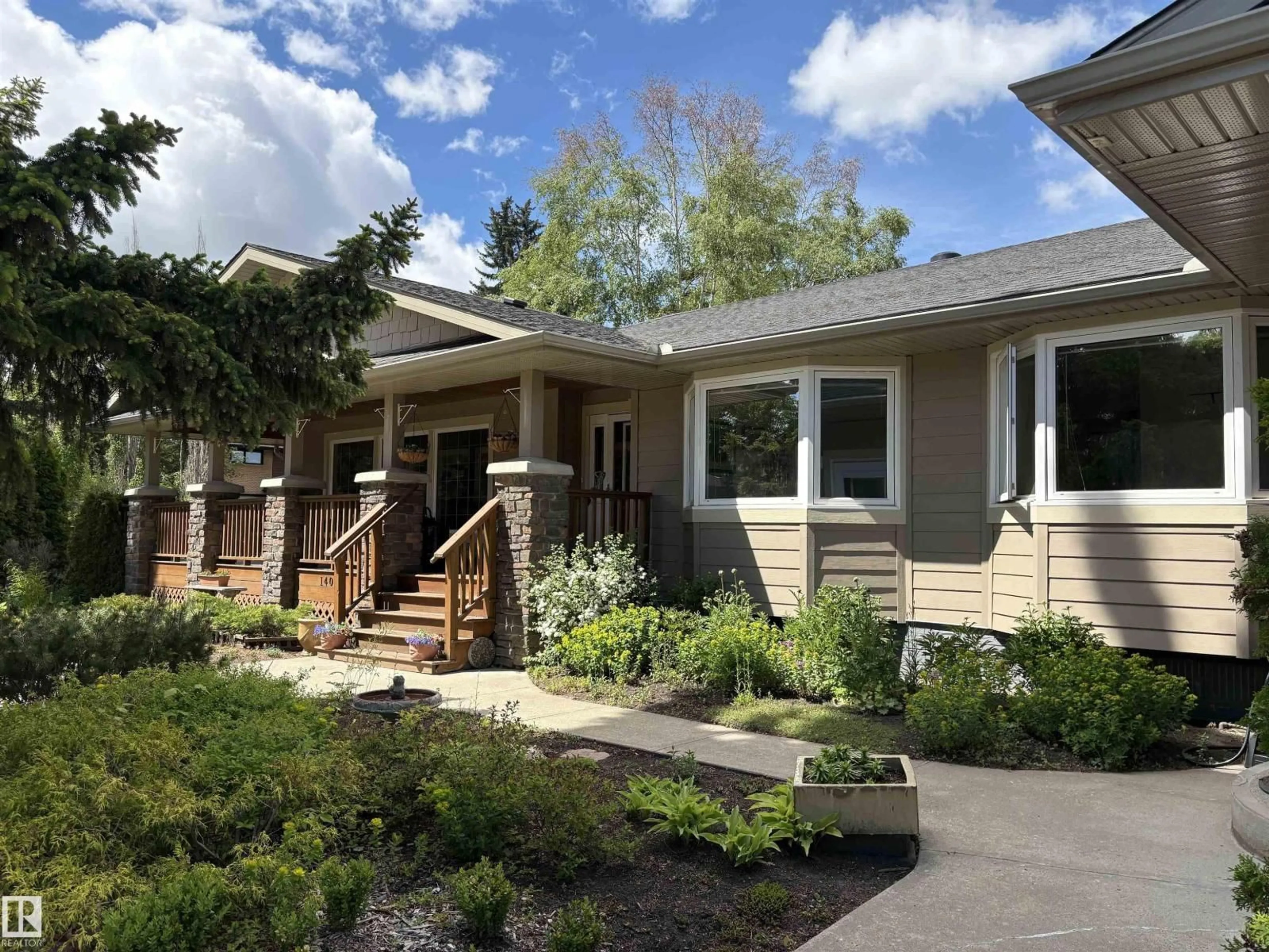 Home with vinyl exterior material, street for 14016 85 AV, Edmonton Alberta T5R3Y8