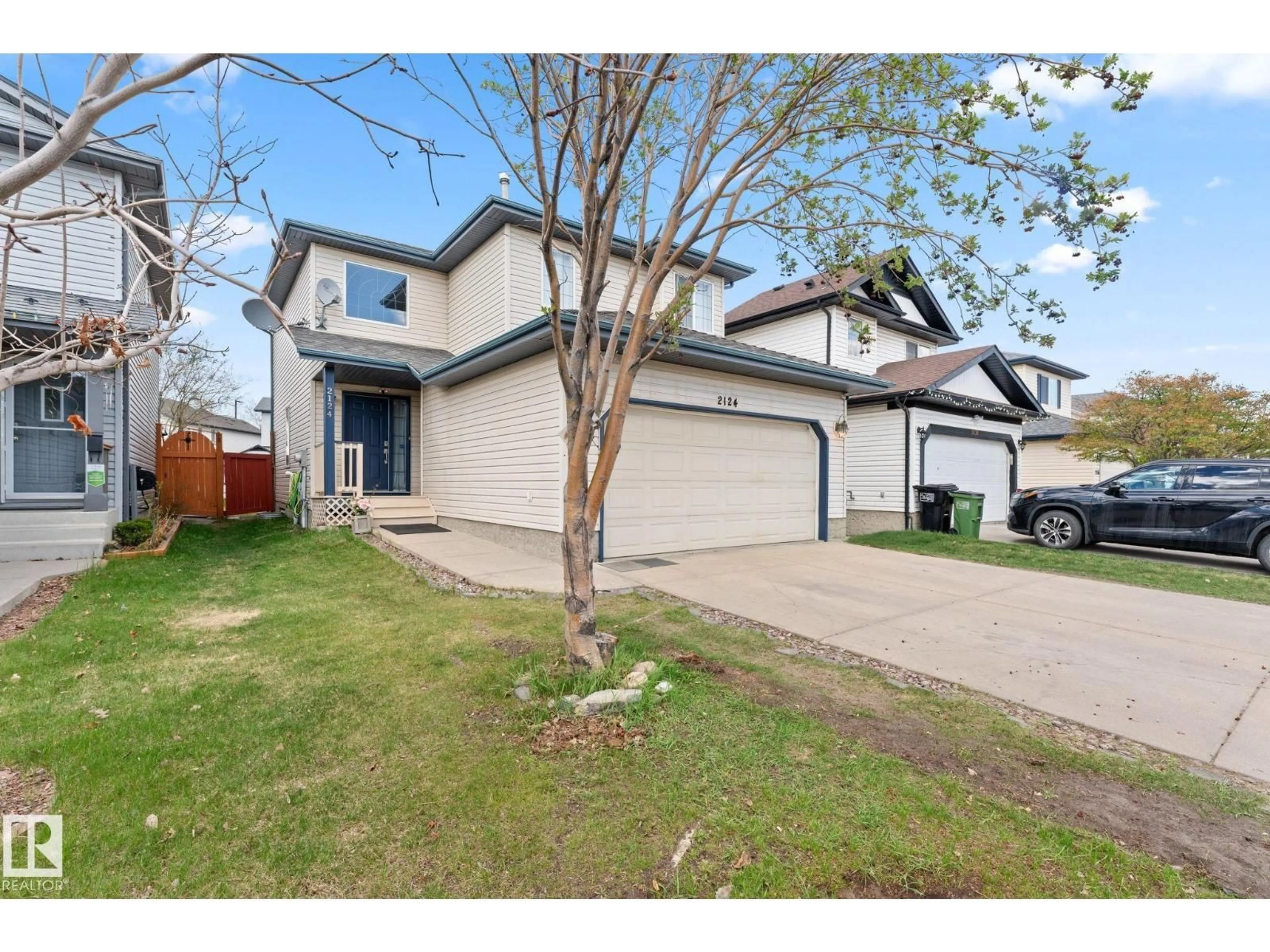 A pic from outside/outdoor area/front of a property/back of a property/a pic from drone, street for 2124 35A AV, Edmonton Alberta T6T1W3