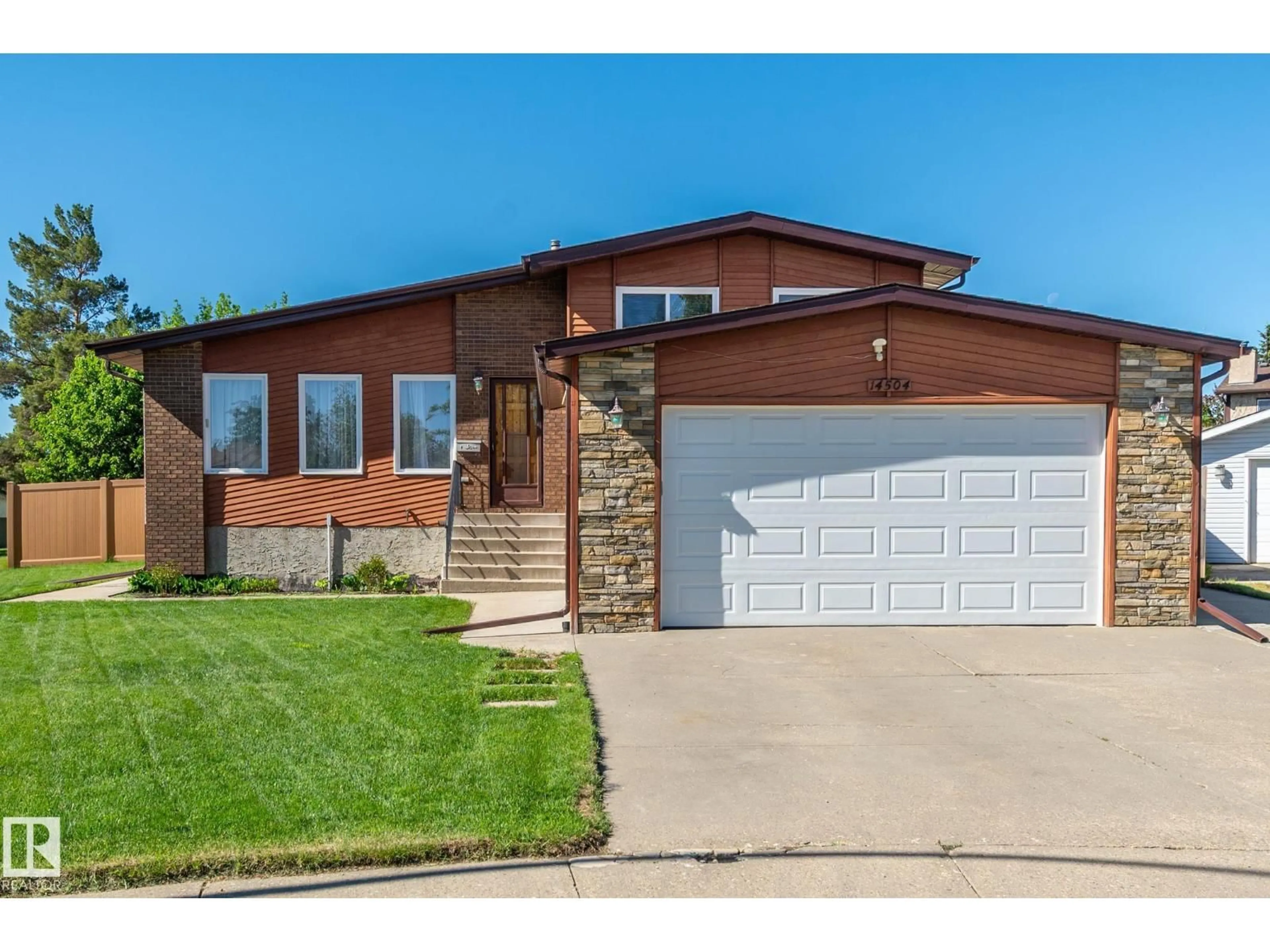 Home with brick exterior material, street for NW - 14504 30 ST, Edmonton Alberta T5Y2C3