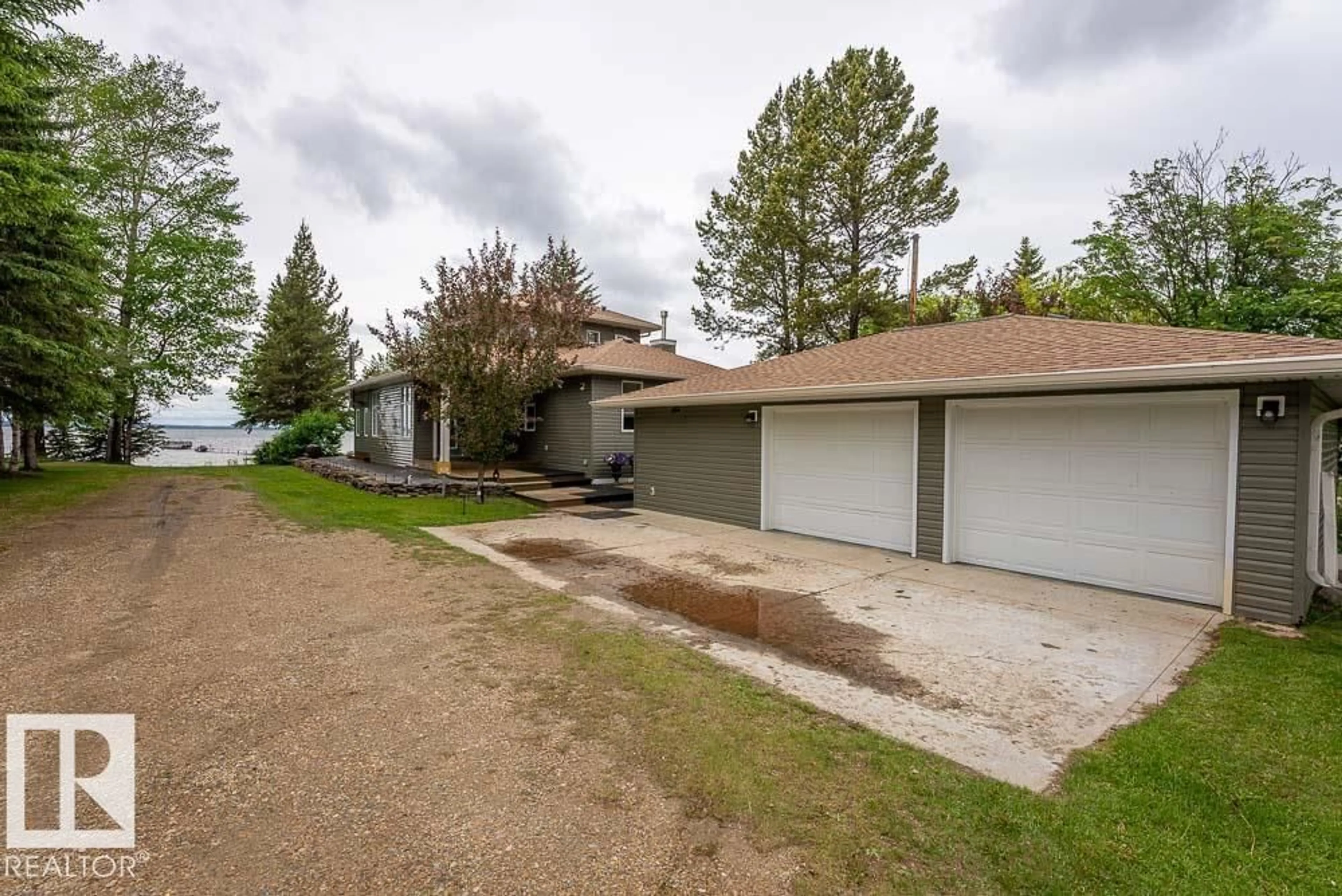 A pic from outside/outdoor area/front of a property/back of a property/a pic from drone, street for A38 BERNICE AVE, Rural Leduc County Alberta T0C2P0