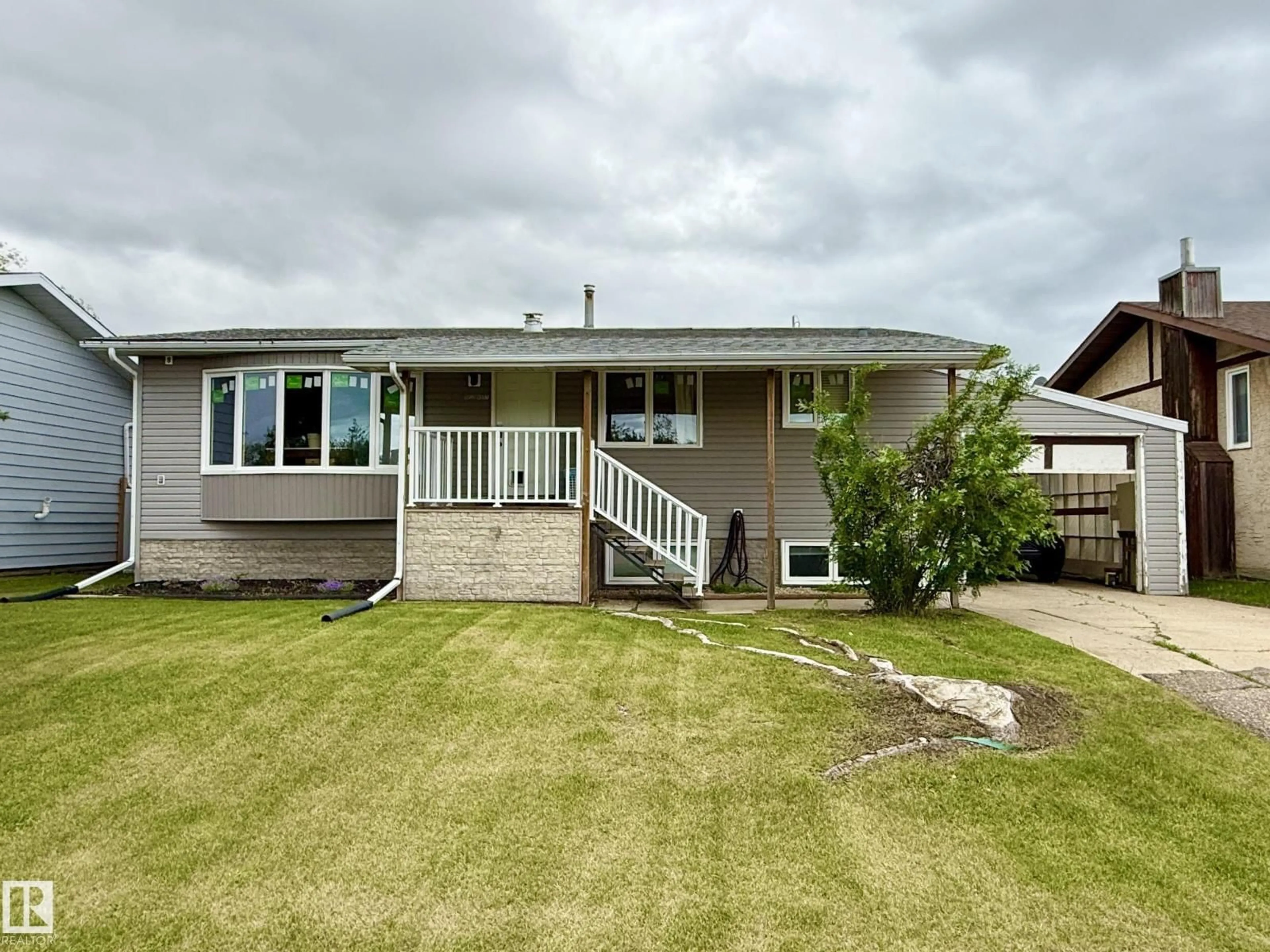Home with vinyl exterior material, street for 5032 45 ST, Lamont Alberta T0B2R0