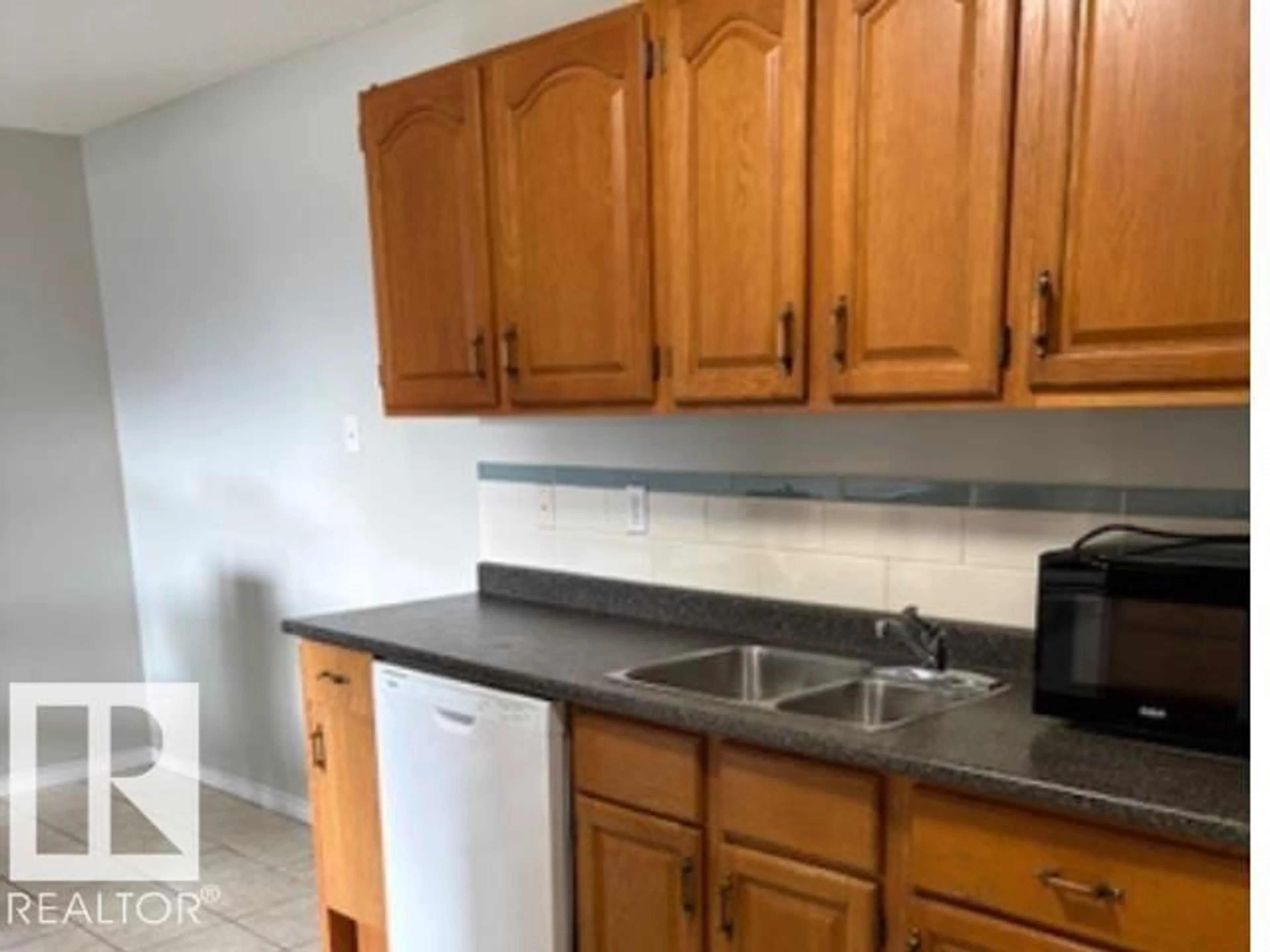 Standard kitchen, unknown for #107 - 10023 164 ST, Edmonton Alberta T5P4L4