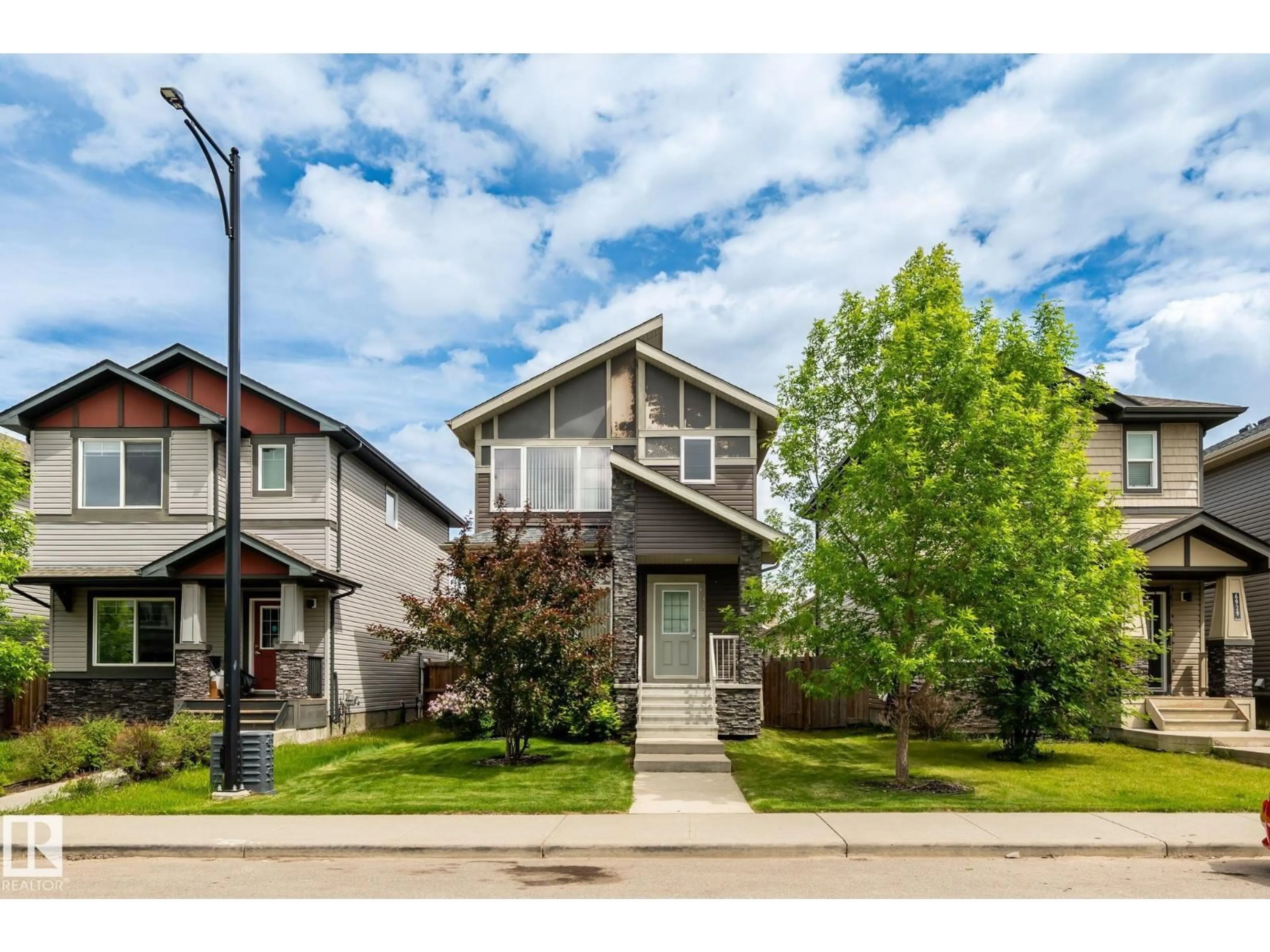 Home with vinyl exterior material, street for SW - 6927 CARDINAL WYND, Edmonton Alberta T6W2Y3