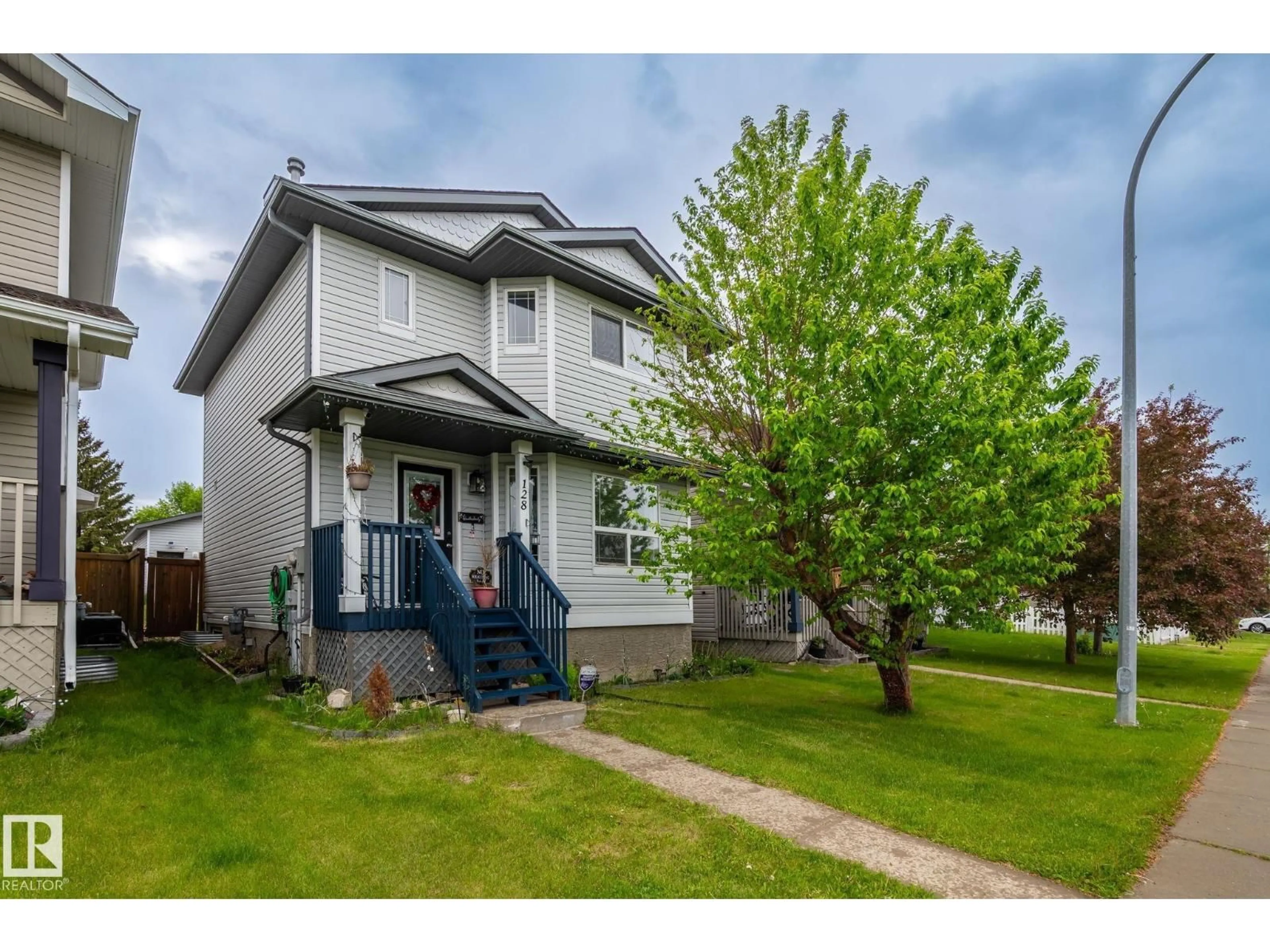Home with vinyl exterior material, street for 128 BROOKVIEW WY, Stony Plain Alberta T7Z2X6