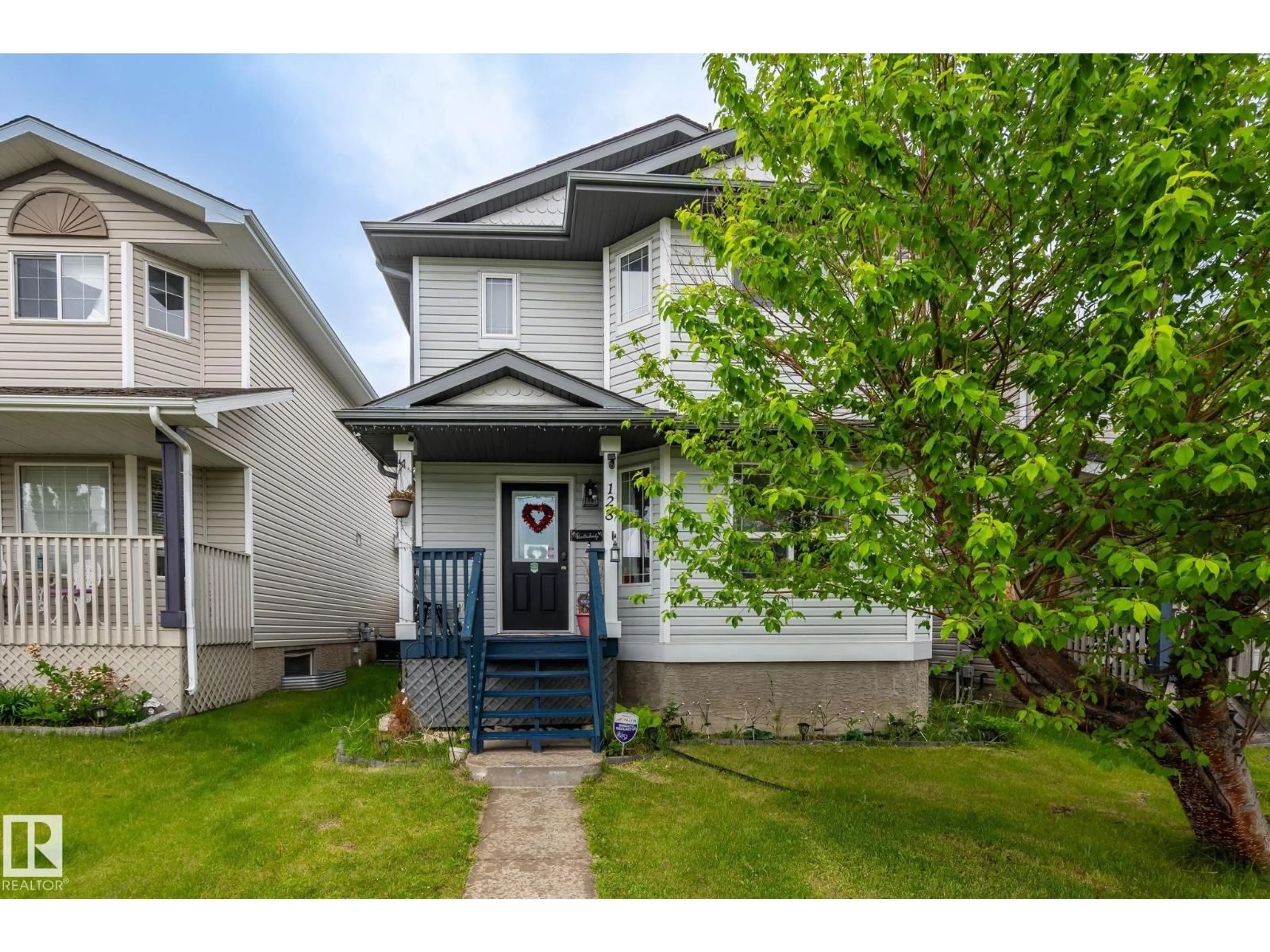 Home with vinyl exterior material, street for 128 BROOKVIEW WY, Stony Plain Alberta T7Z2X6
