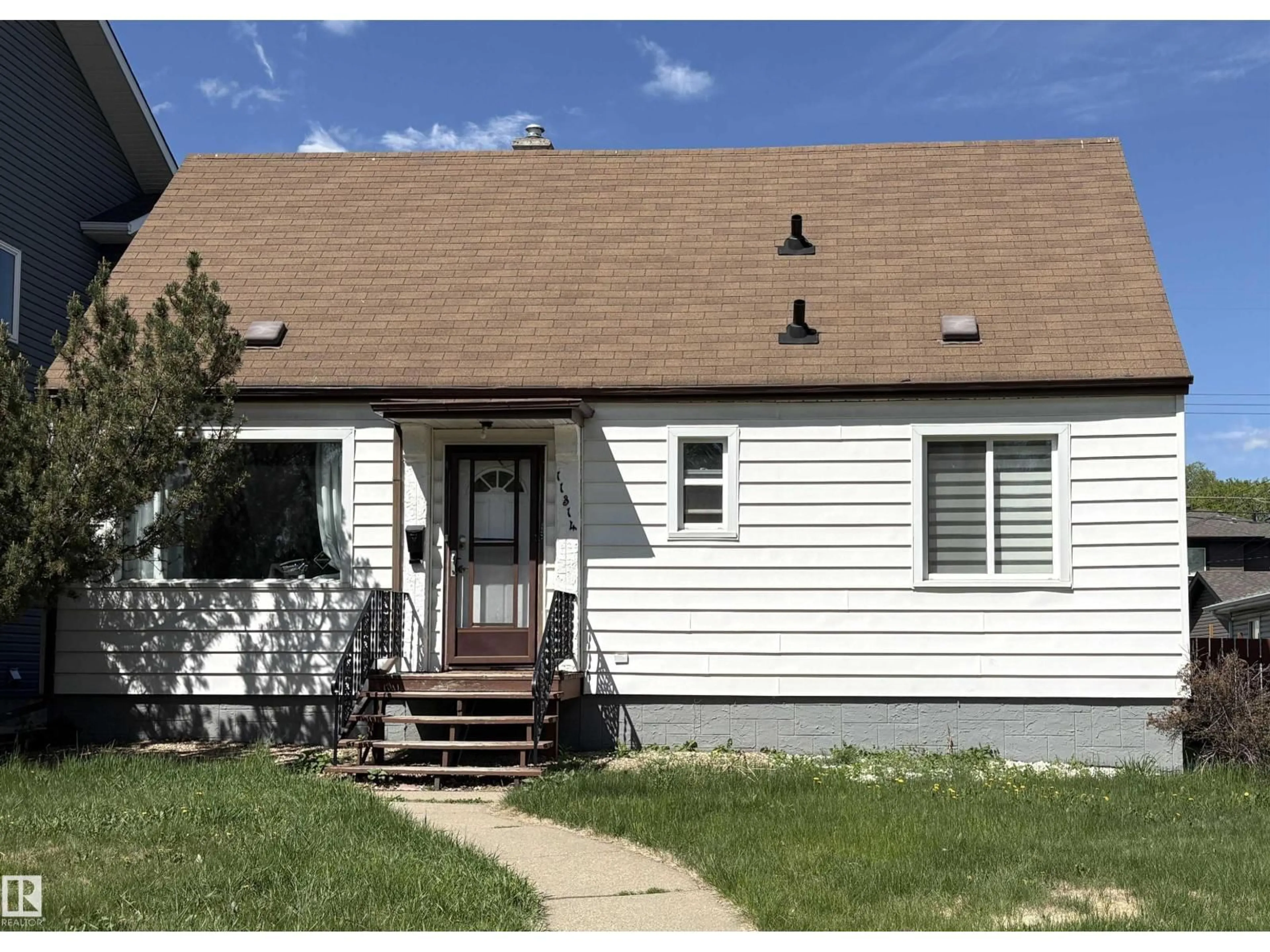 Home with vinyl exterior material, street for 11314 78 AV, Edmonton Alberta T6G0H3