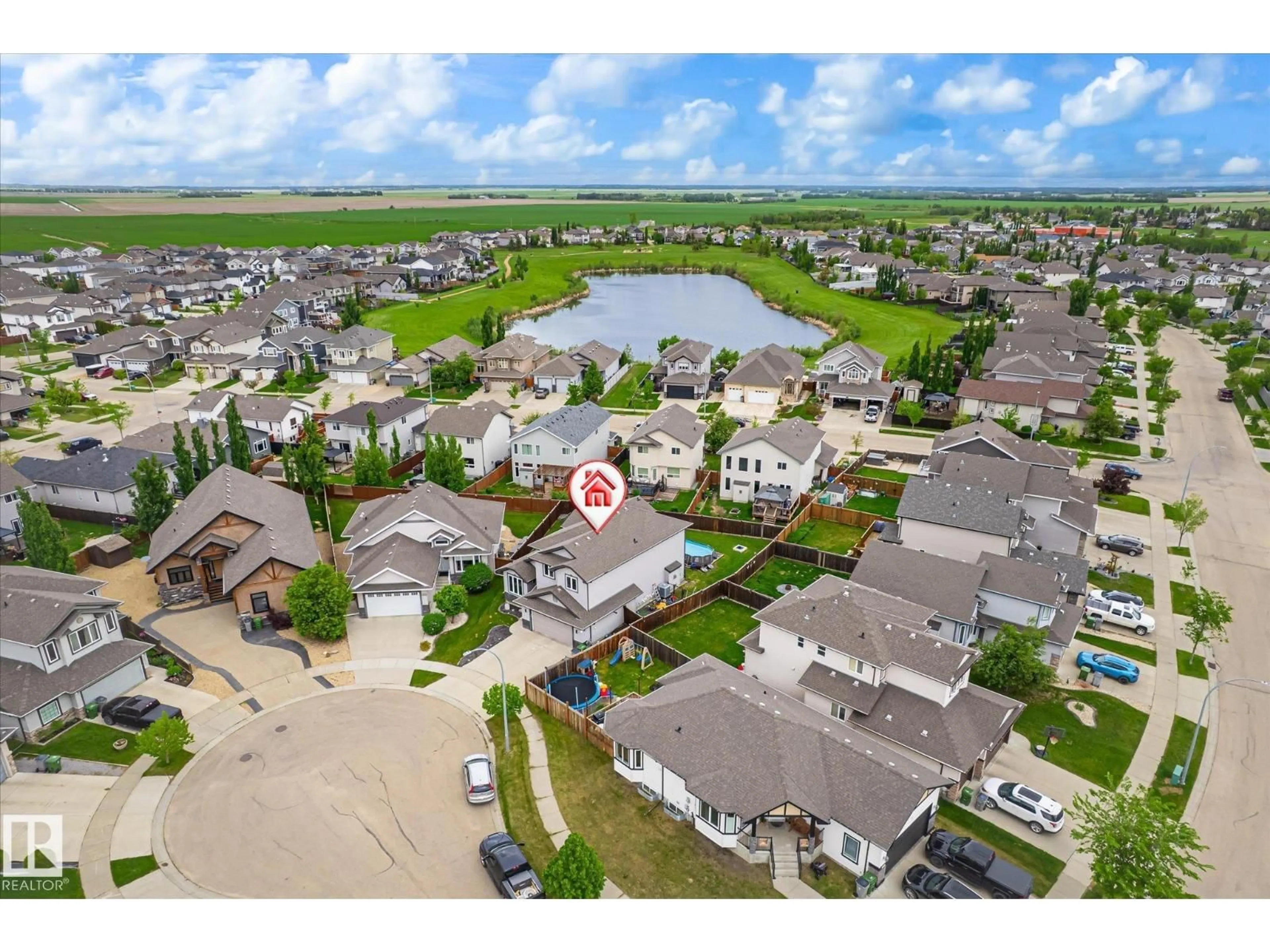 A pic from outside/outdoor area/front of a property/back of a property/a pic from drone, water/lake/river/ocean view for 10405 98 ST, Morinville Alberta T8R0B7