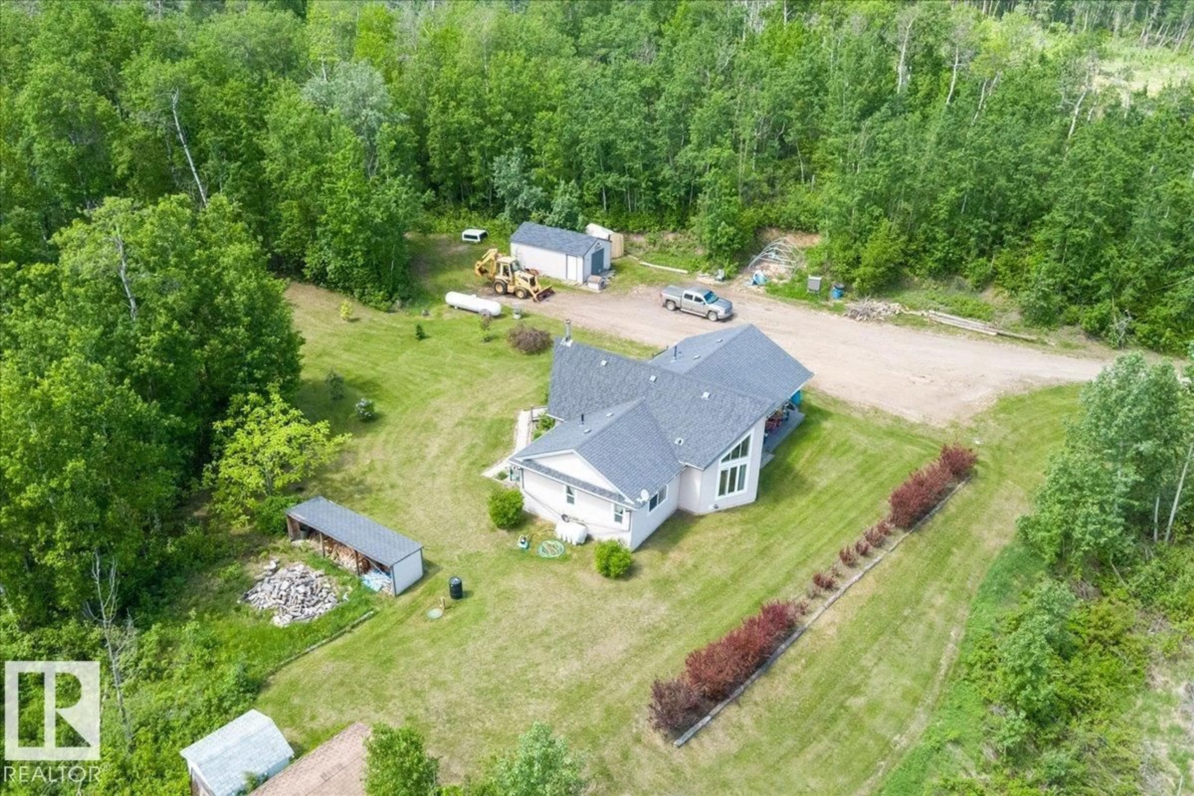 A pic from outside/outdoor area/front of a property/back of a property/a pic from drone, unknown for 11 - 52210 RANGE ROAD 192, Rural Beaver County Alberta T0B4J1