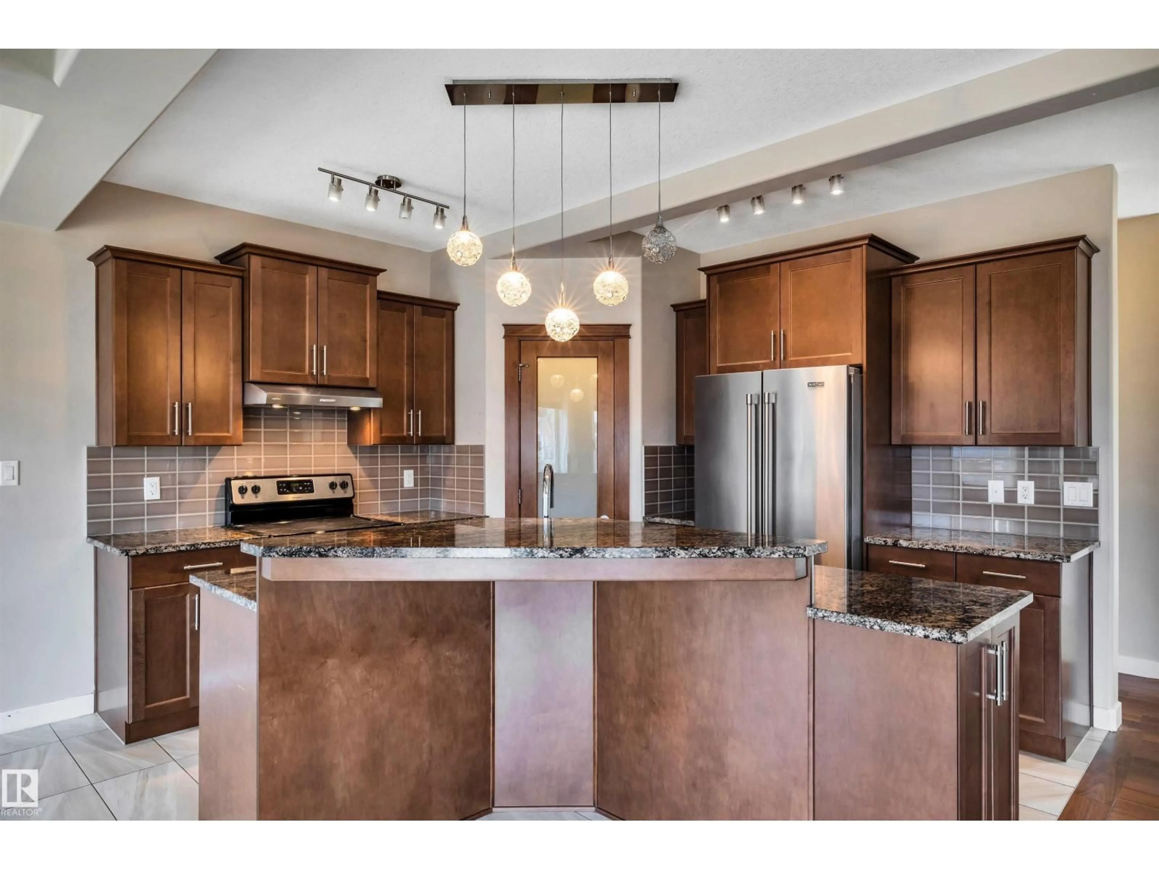 Open concept kitchen, ceramic/tile floor for 1461 WATT DR, Edmonton Alberta T6X1T1