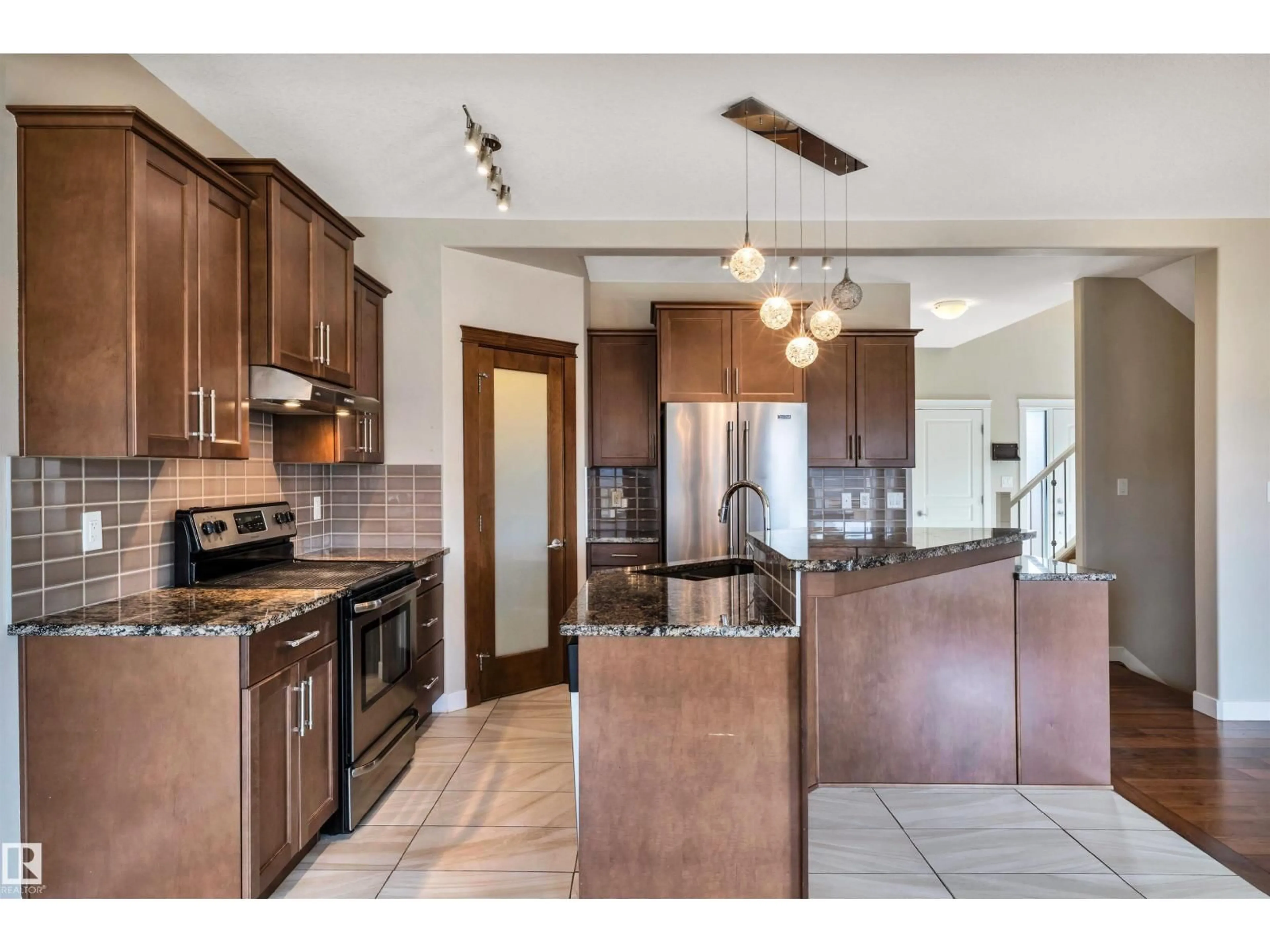 Open concept kitchen, unknown for 1461 WATT DR, Edmonton Alberta T6X1T1