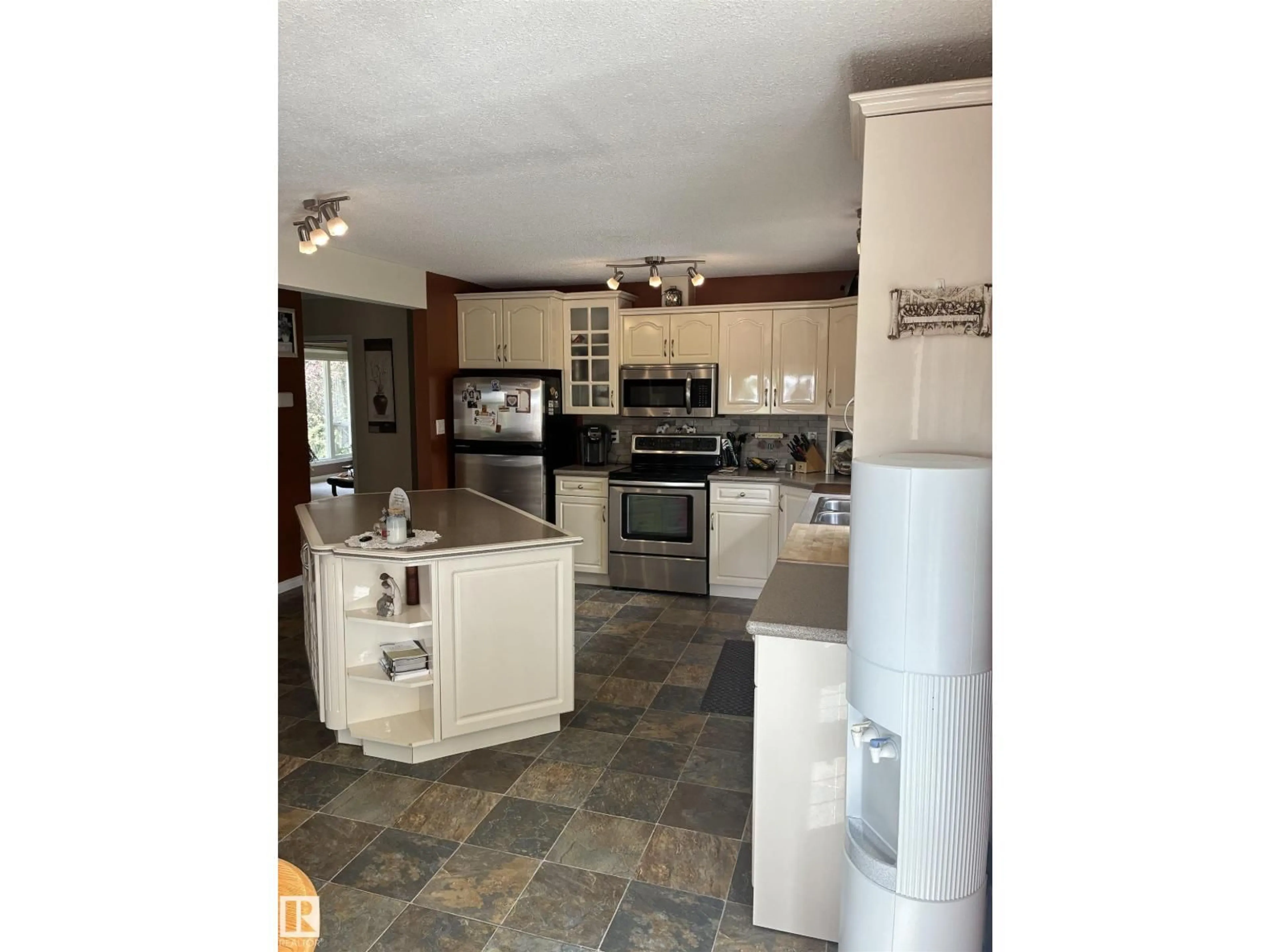 Open concept kitchen, ceramic/tile floor for 25055 TWP RD 492, Rural Leduc County Alberta T4X2M6