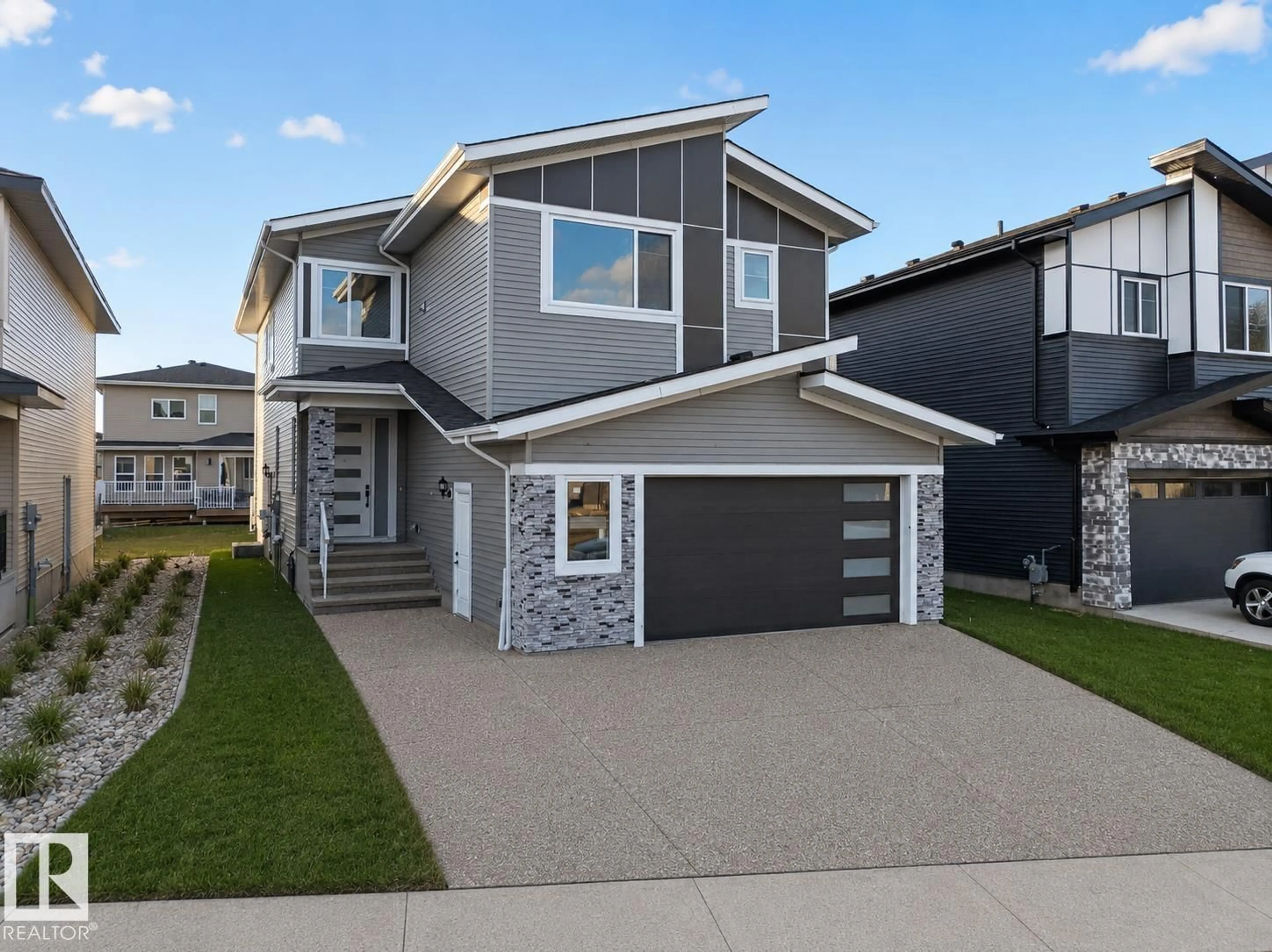 Home with vinyl exterior material, street for 2726 63AVE, Rural Leduc County Alberta T6X3A6