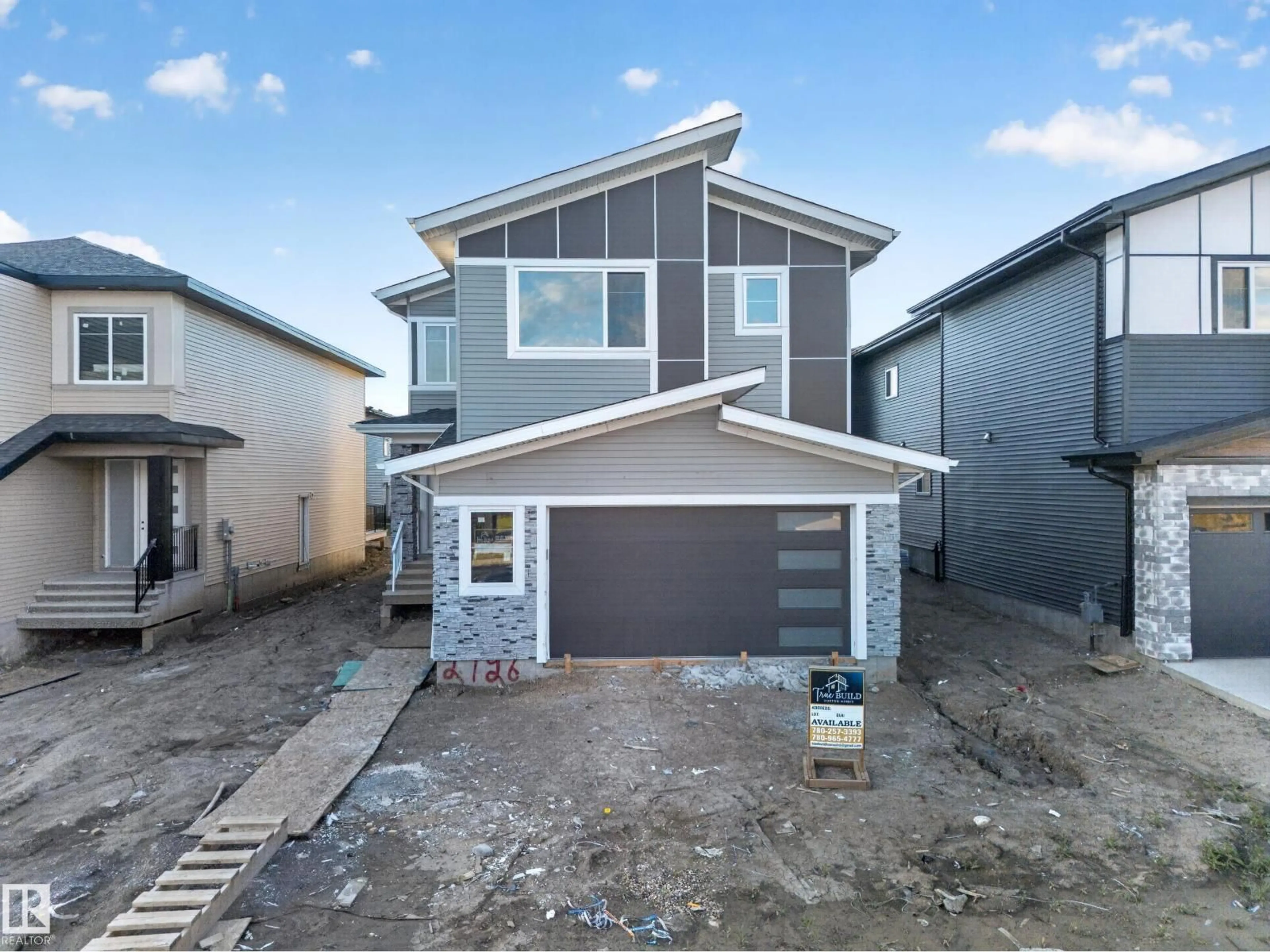 Home with vinyl exterior material, street for 2726 63AVE, Rural Leduc County Alberta T6X3A6
