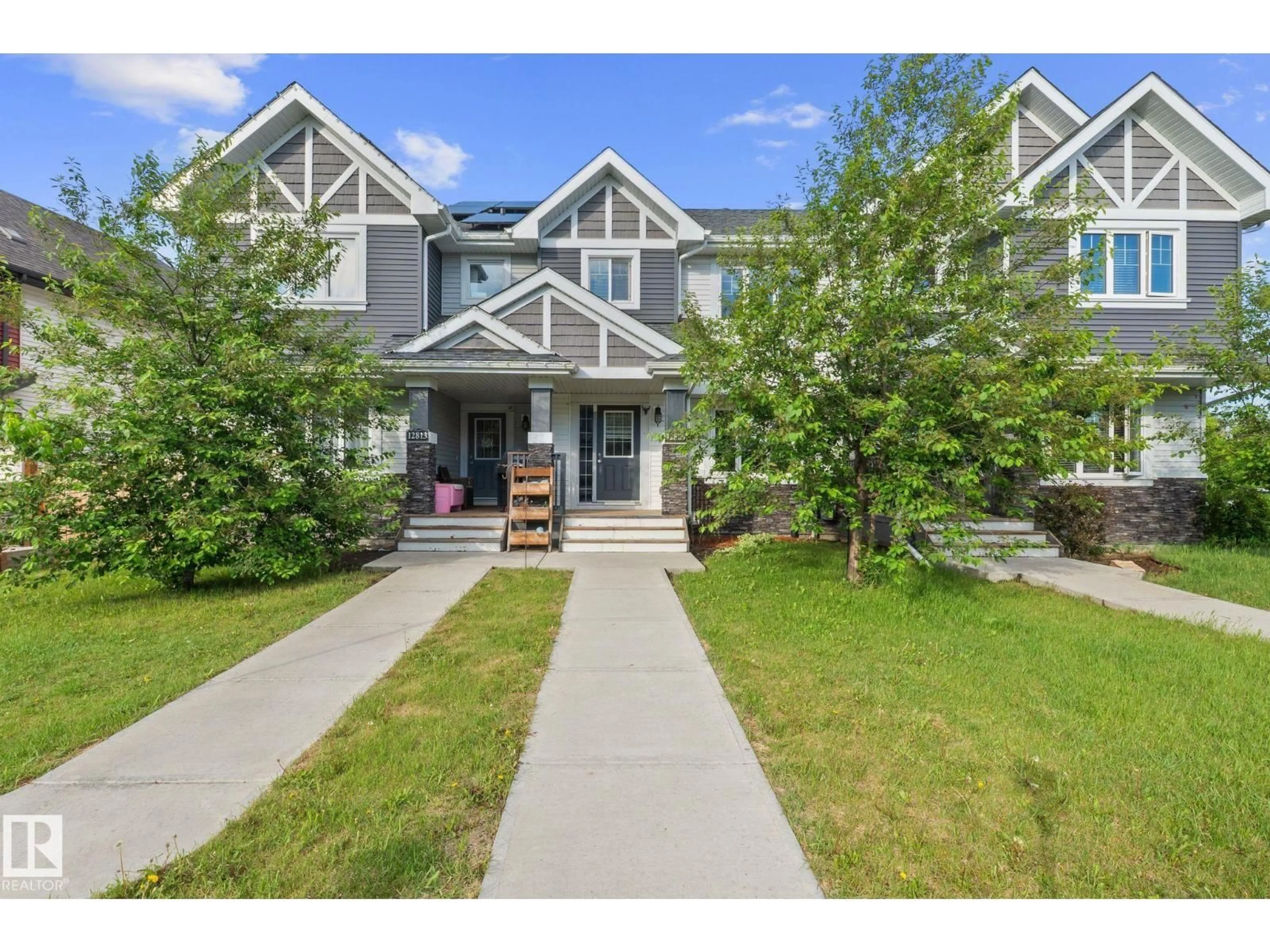 A pic from outside/outdoor area/front of a property/back of a property/a pic from drone, unknown for 12809 203A NW, Edmonton Alberta T5S0M6