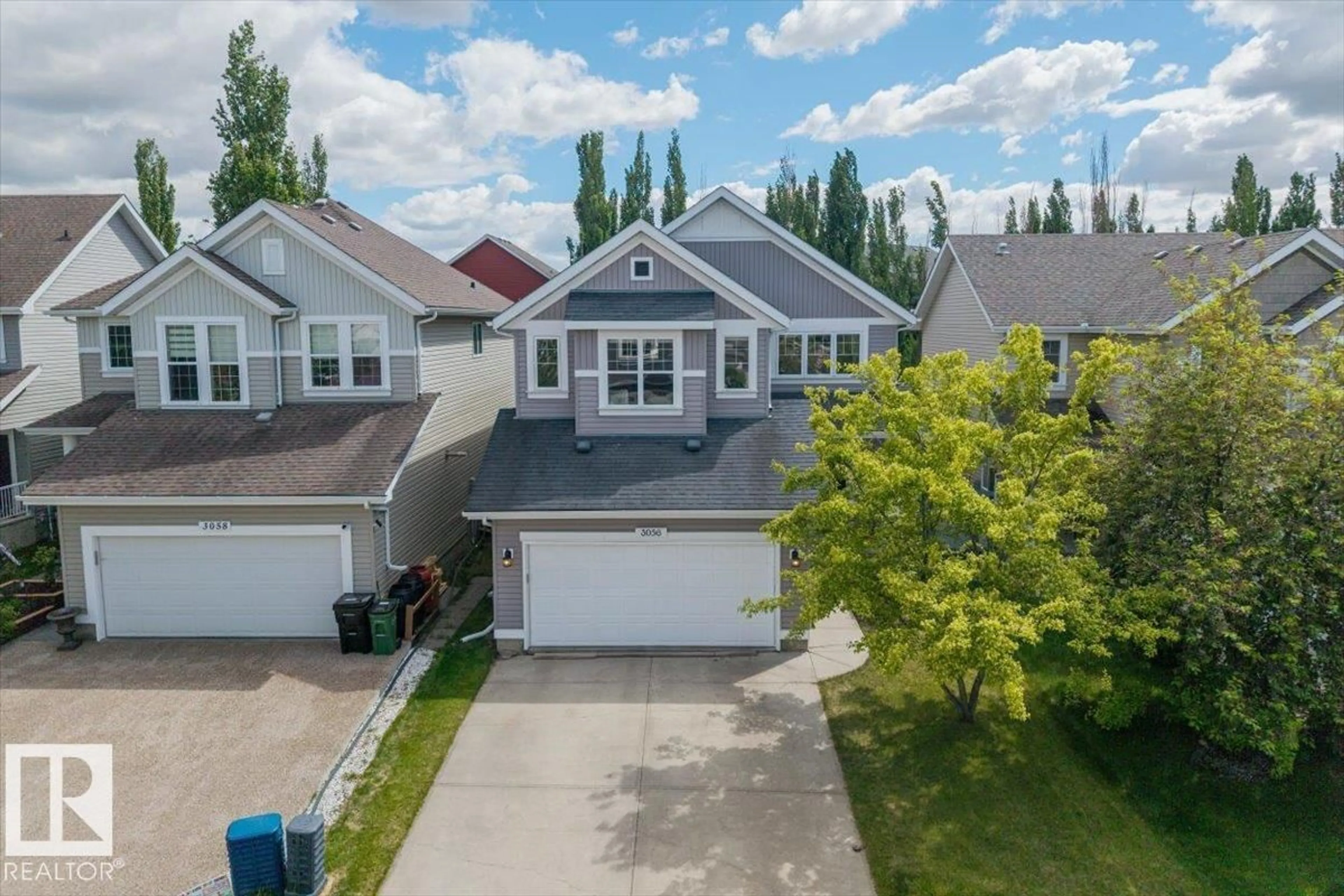 A pic from outside/outdoor area/front of a property/back of a property/a pic from drone, unknown for SW - 3056 SPENCE WD, Edmonton Alberta T6X0A5