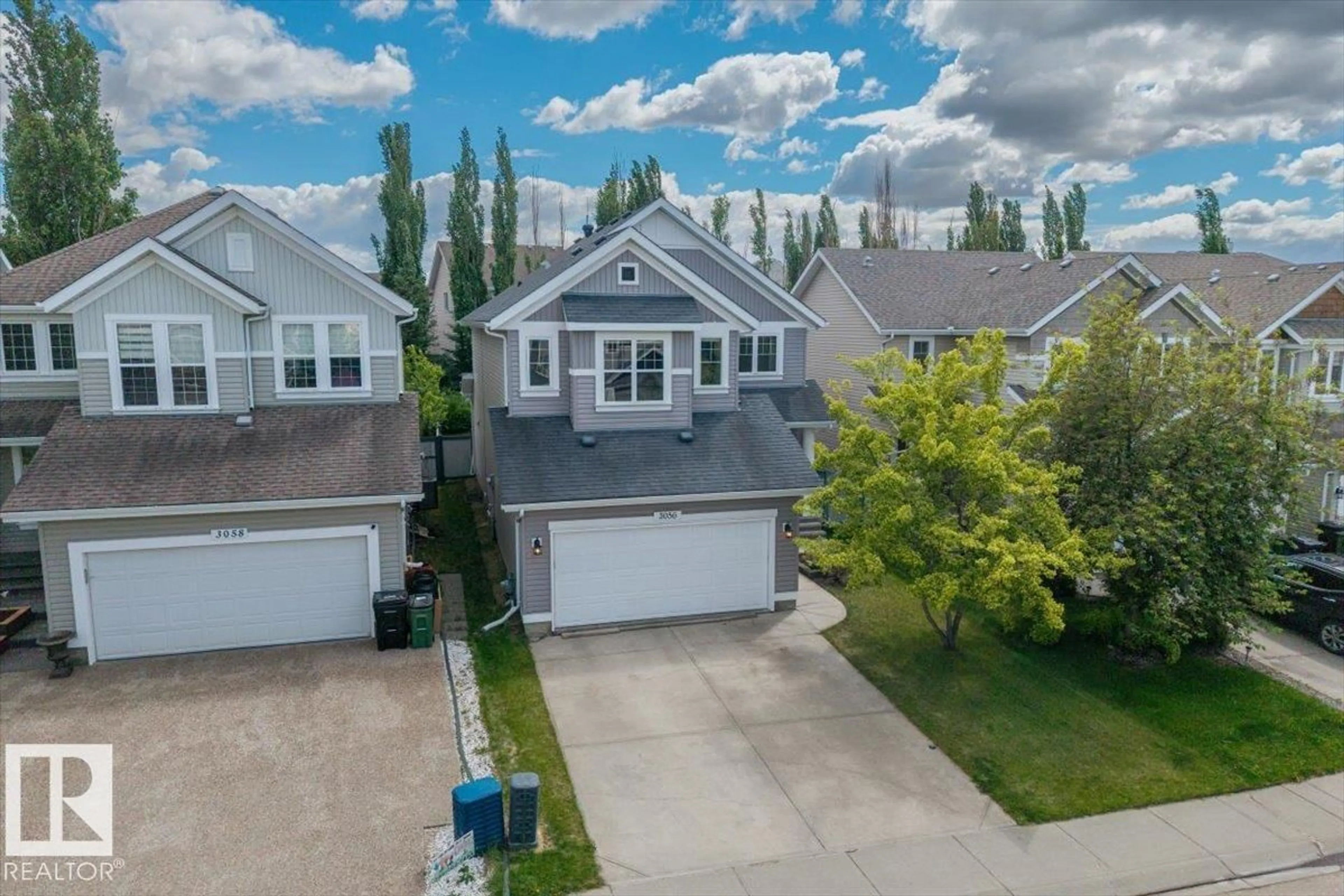 A pic from outside/outdoor area/front of a property/back of a property/a pic from drone, unknown for SW - 3056 SPENCE WD, Edmonton Alberta T6X0A5